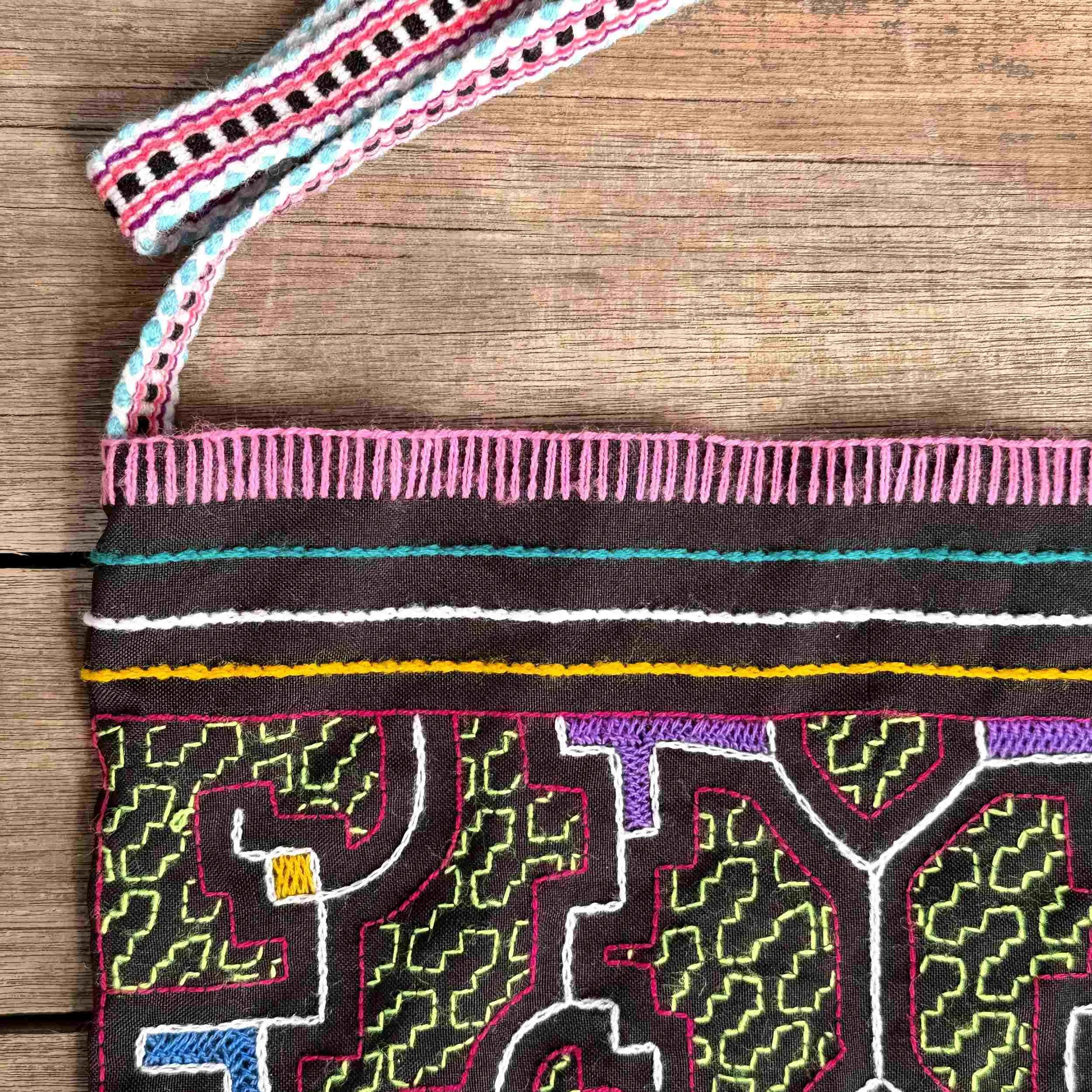 handmade-peruvian-embroidered-bag-black-strap-detail.jpg