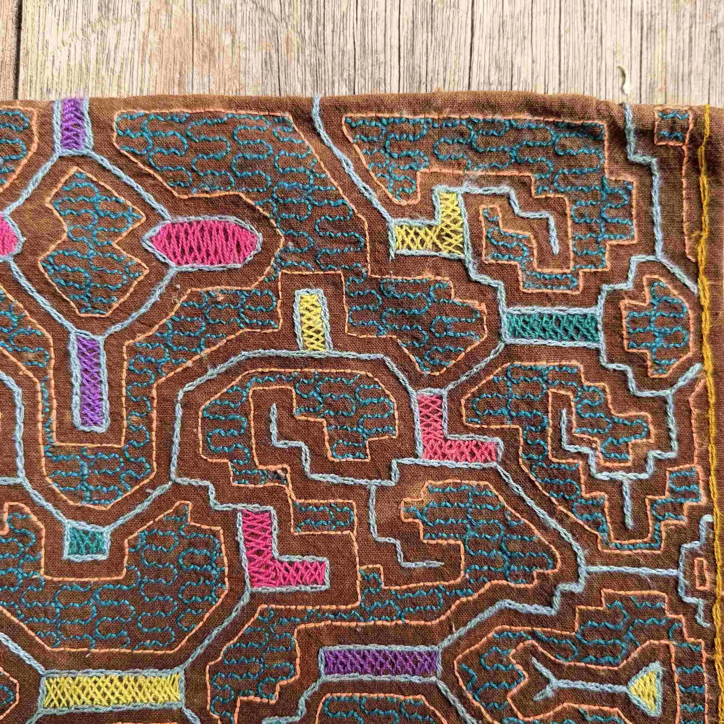 handmade-peruvian-embroidered-bag-brown-pattern-detail.jpg