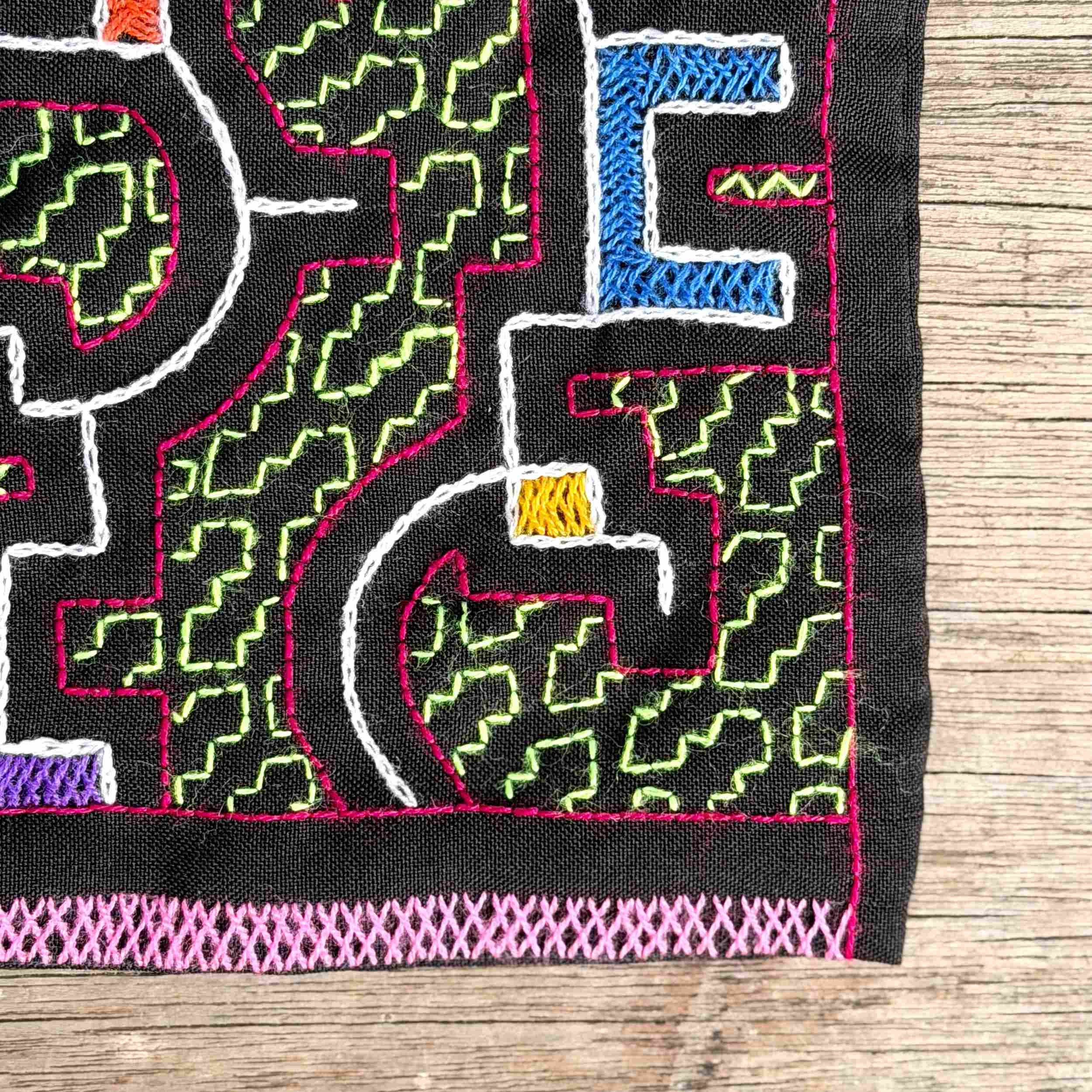 handmade-peruvian-embroidered-bag-black-pattern-detail.jpg