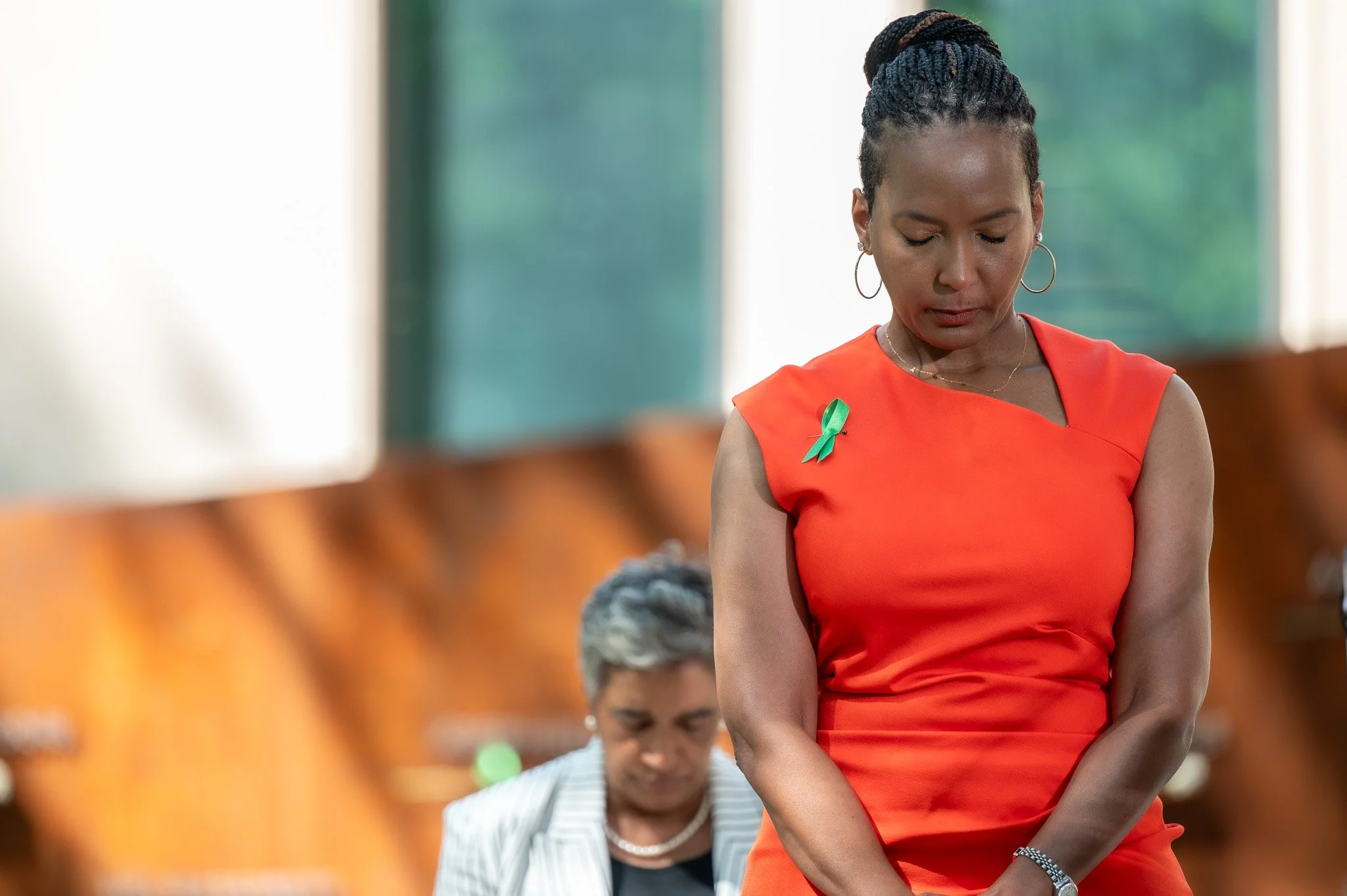 Former City of Atlanta Mayor, Keisha Lance Bottoms, in silent prayer, at the "Atlanta Missing and Murdered Children Memorial" unveiling at Atlanta City Hall.