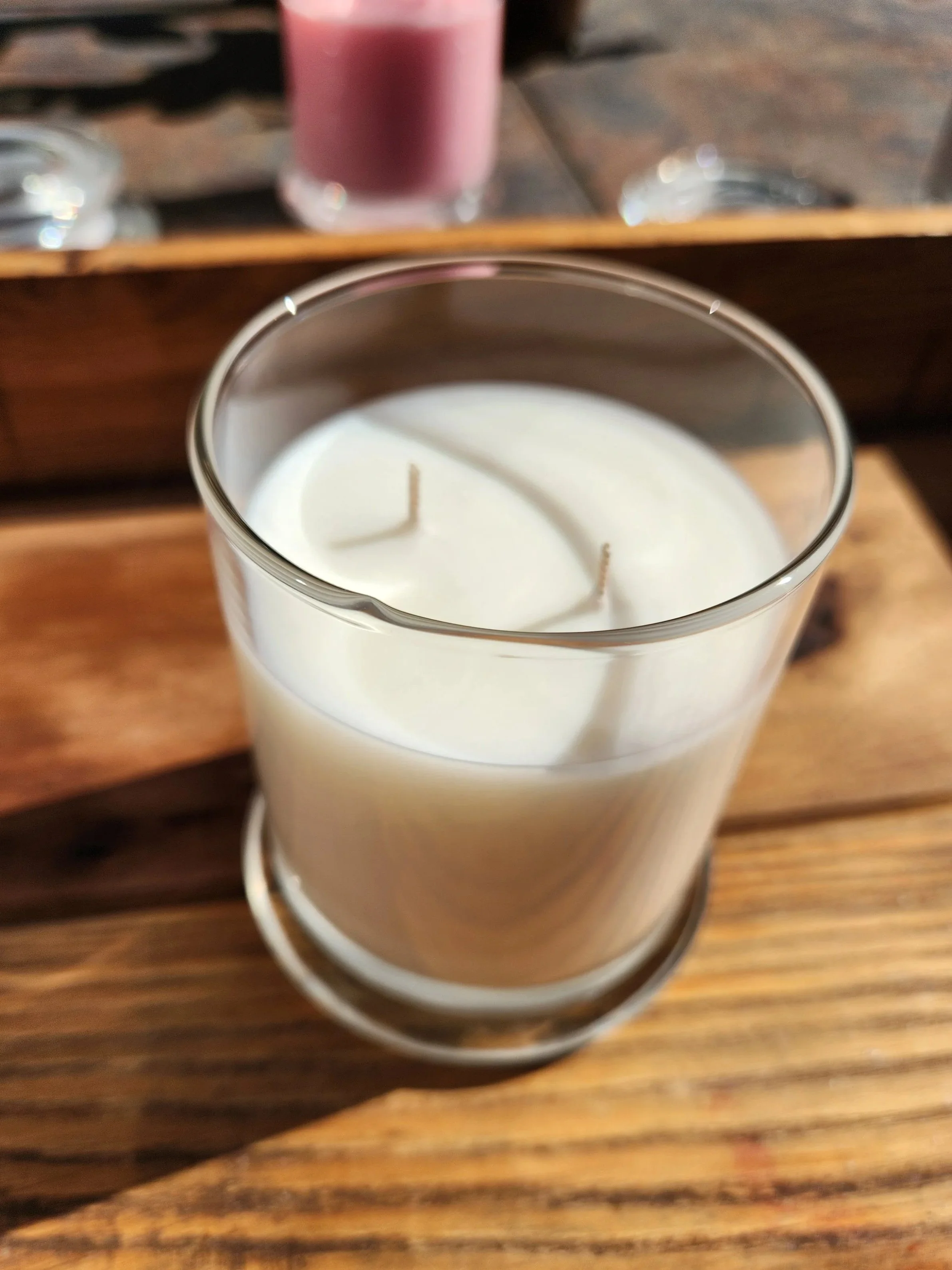1000028641.jpg  Clear Glass Candle with 2 cotton wicks, this is a white wax complex yummy vanilla candle