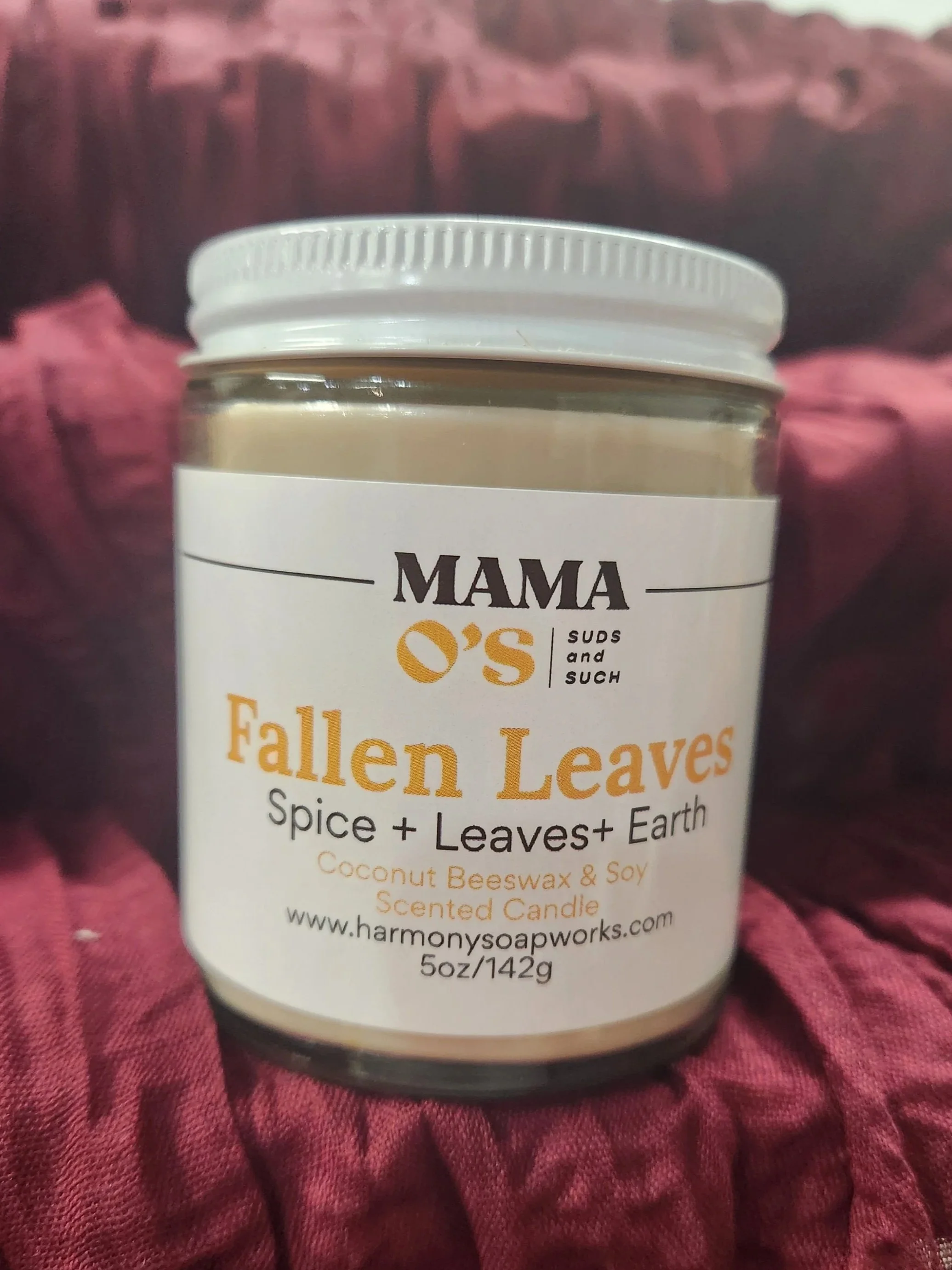 1 clear vessel candle labeled Fallen Leaves with a white metal lid.