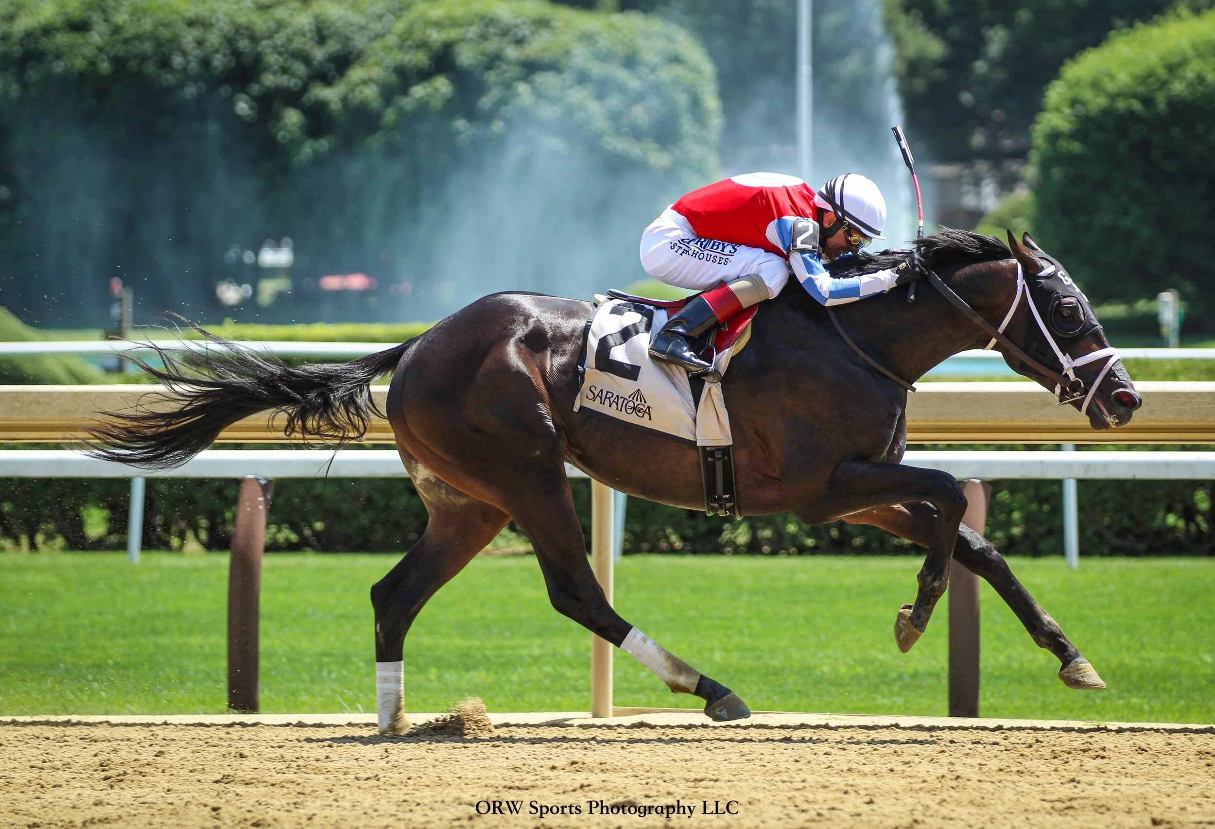 McAfee and John Velazquez take the first race of the summer. 