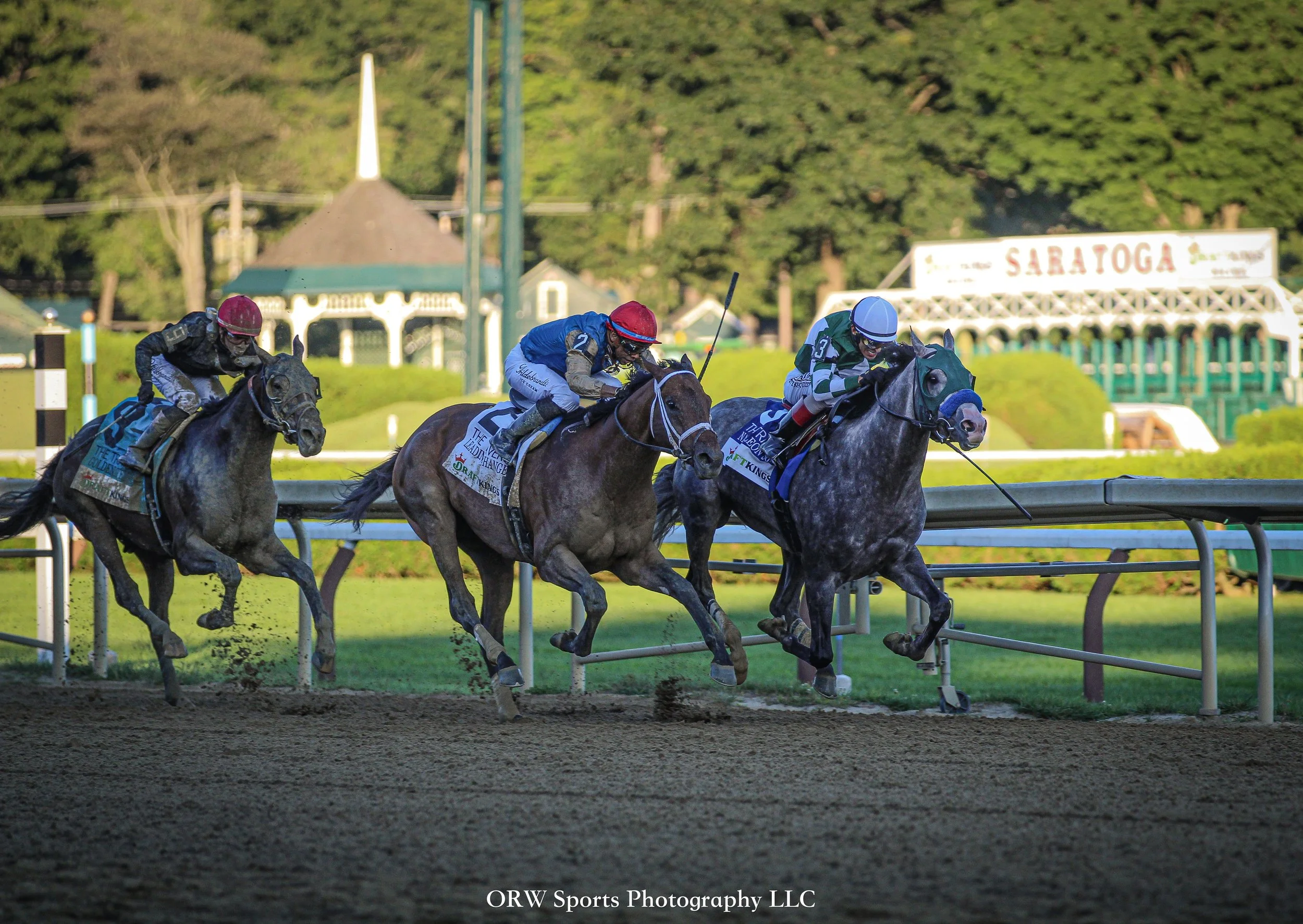 The Gun Runner colt battles with Preakness-winner Napoleon Solo, while Derby and Belmont-winner Golden Tempo runs in third. 
