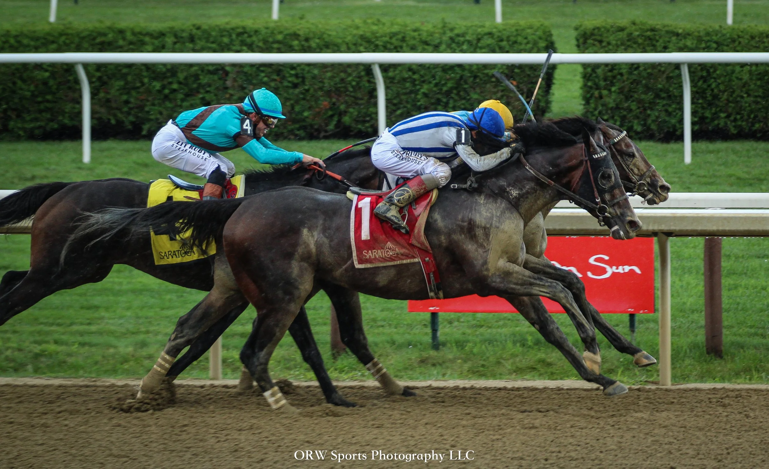 Stars and Stripes denies Parchment Party by a nose in the Birdstone Stakes. It's a 1-2 finish. 