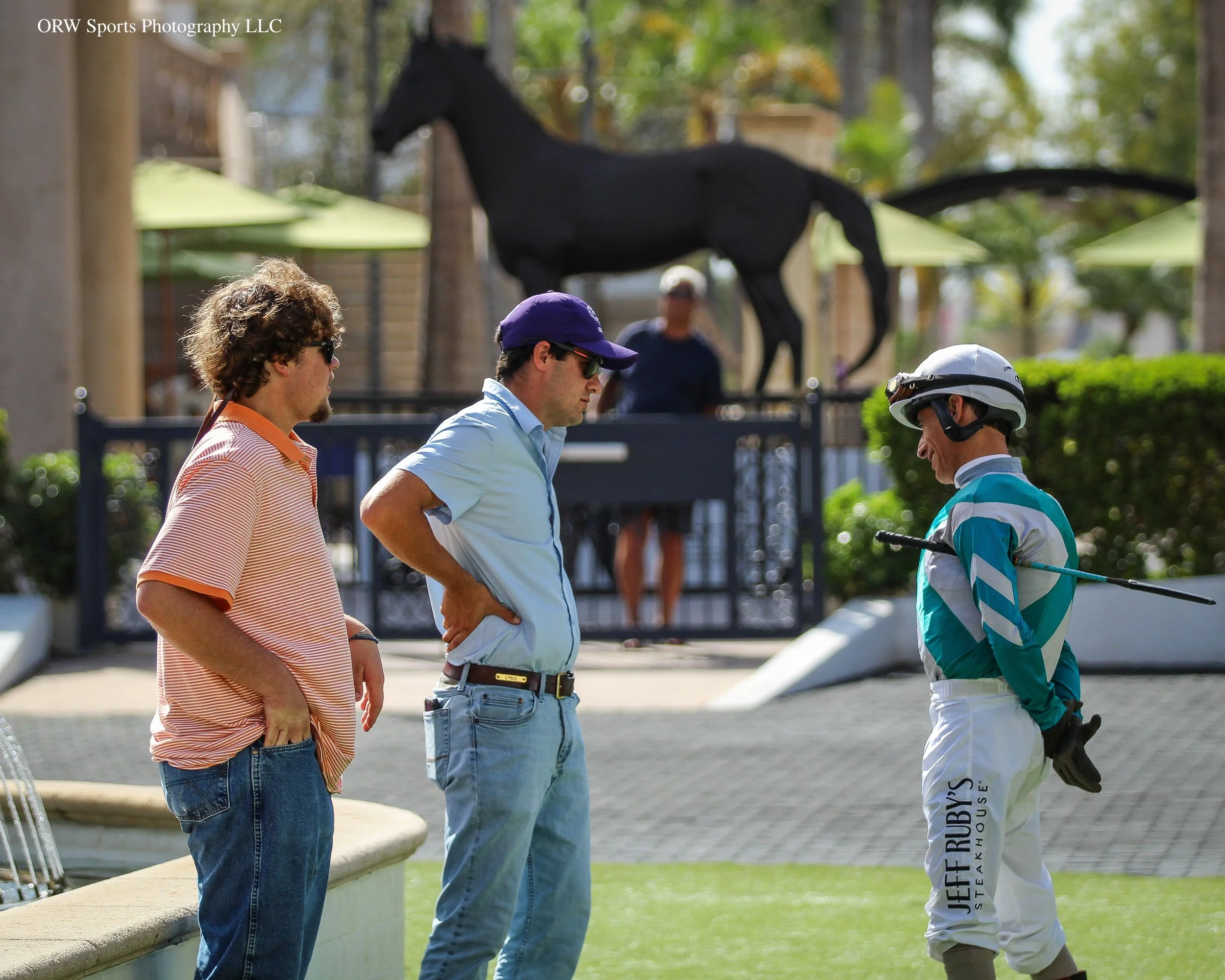 John Velazquez and connections. Cigar keeps watch. 