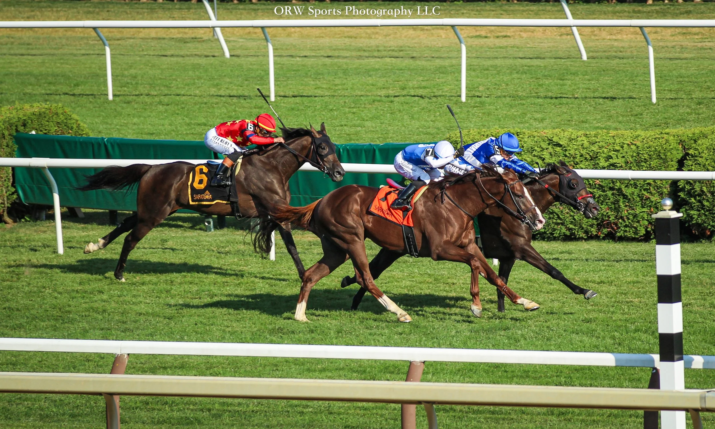 Chummers and Caroline St. Beat duel to the wire while A Little at First trails in third. 