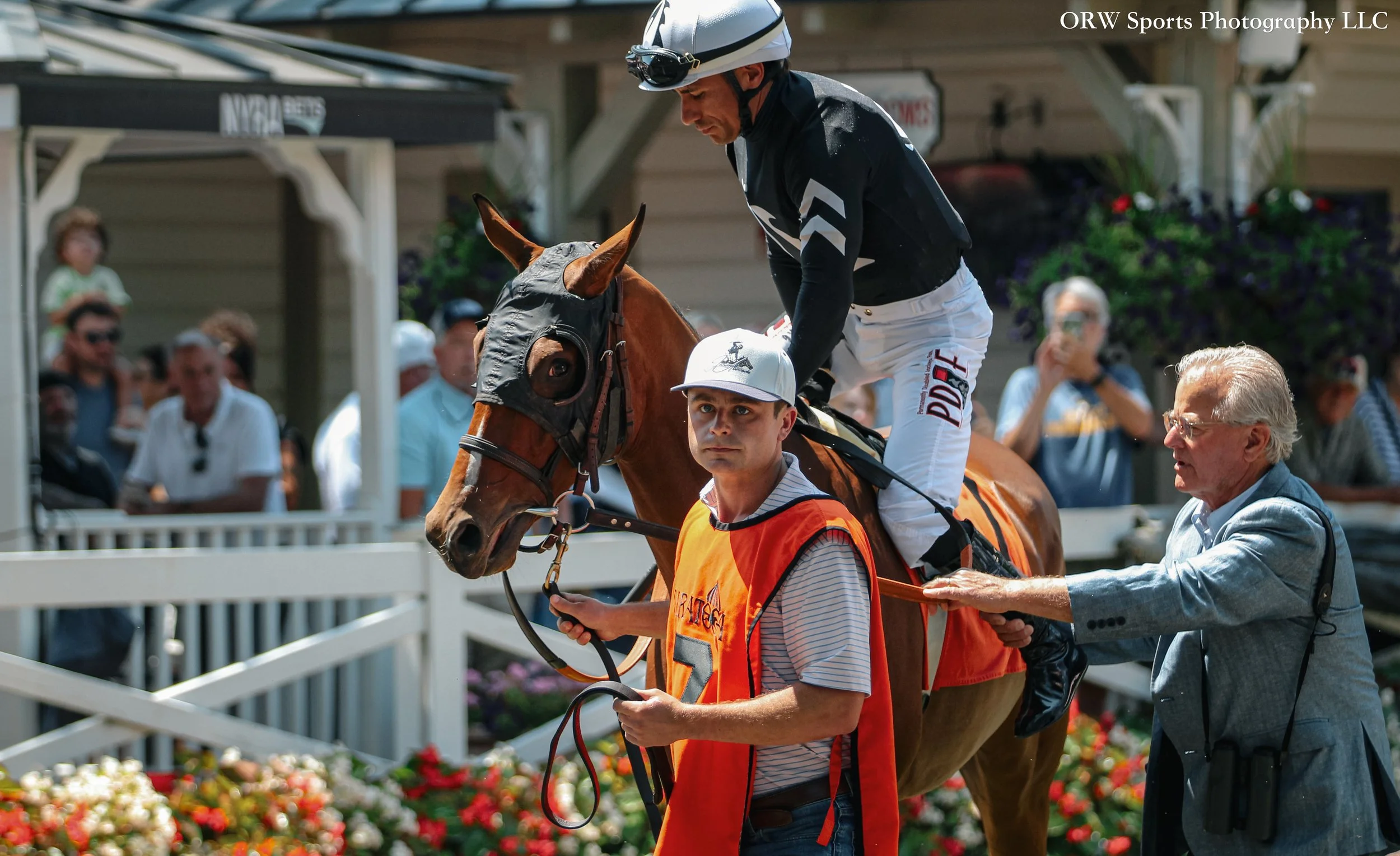 Junior Alvarado gets the leg up from trainer Bill Mott 