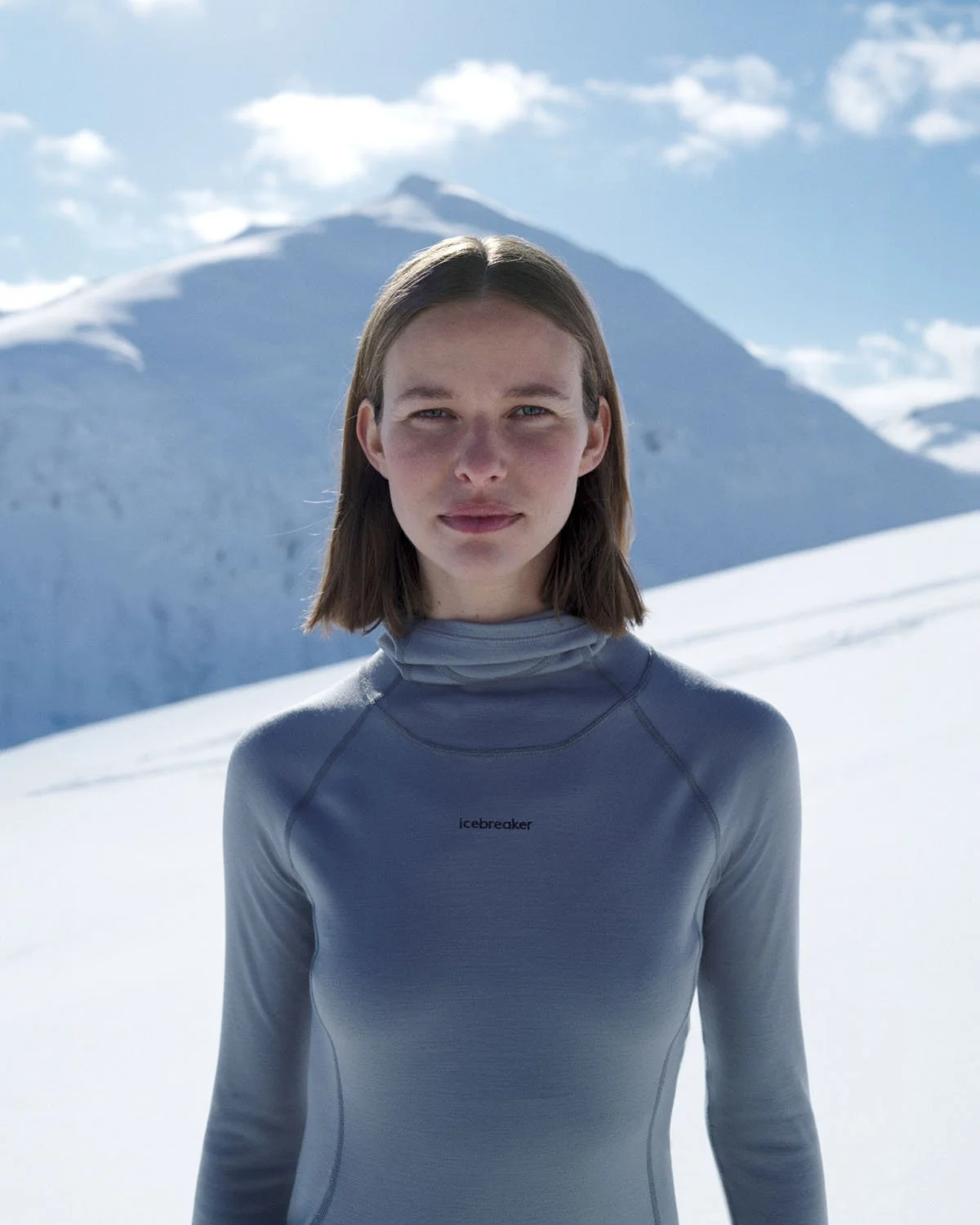 WOMEN-FW25SS26-CAMPAIGN-Women-300-MerinoFineTM-Polar-LS-Roll-Neck-0A57550C5.jpg