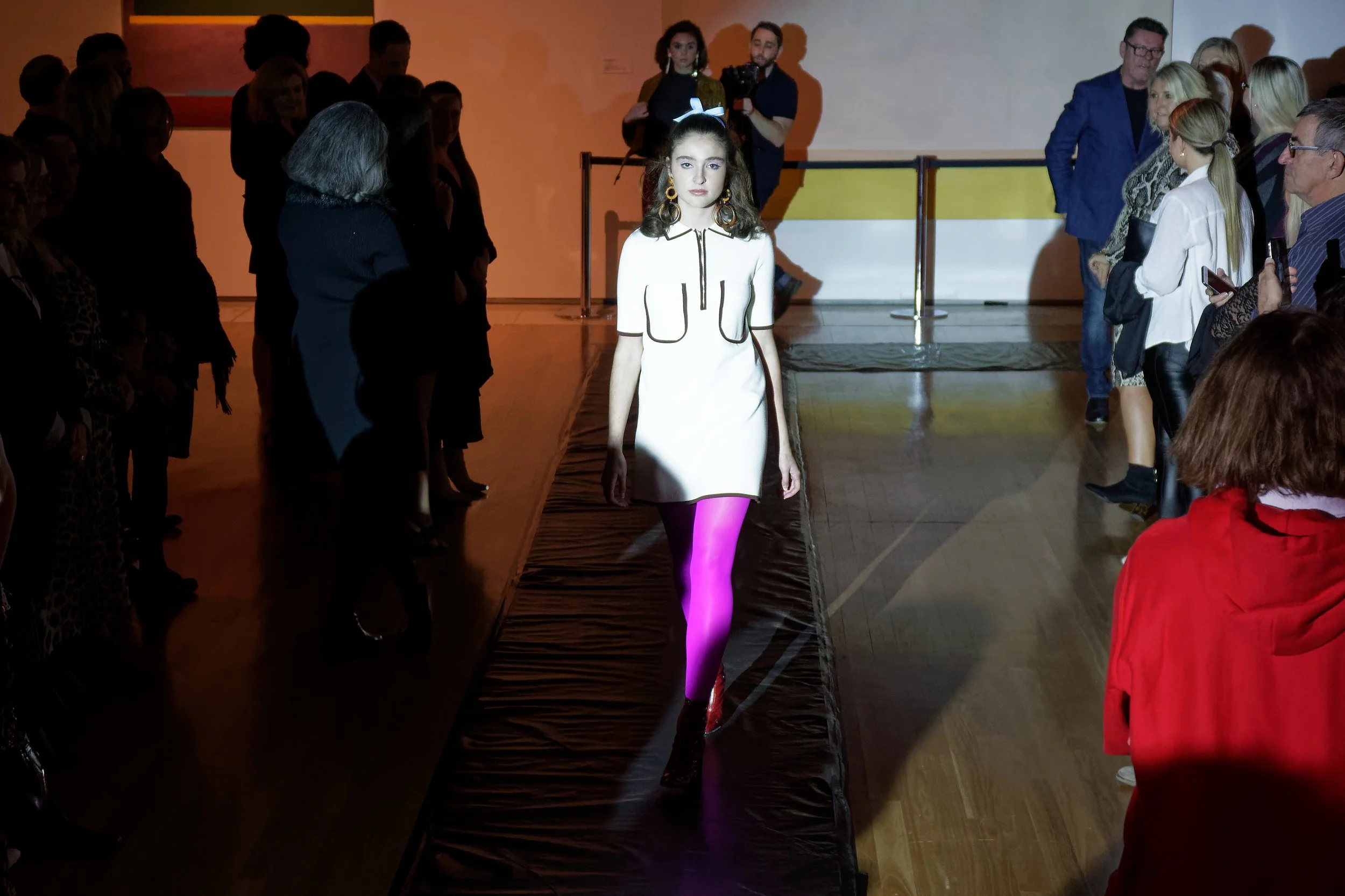 Model Walking down a runway for Façon Magazines Autumn/Winter Runway in Newcastle Museum.