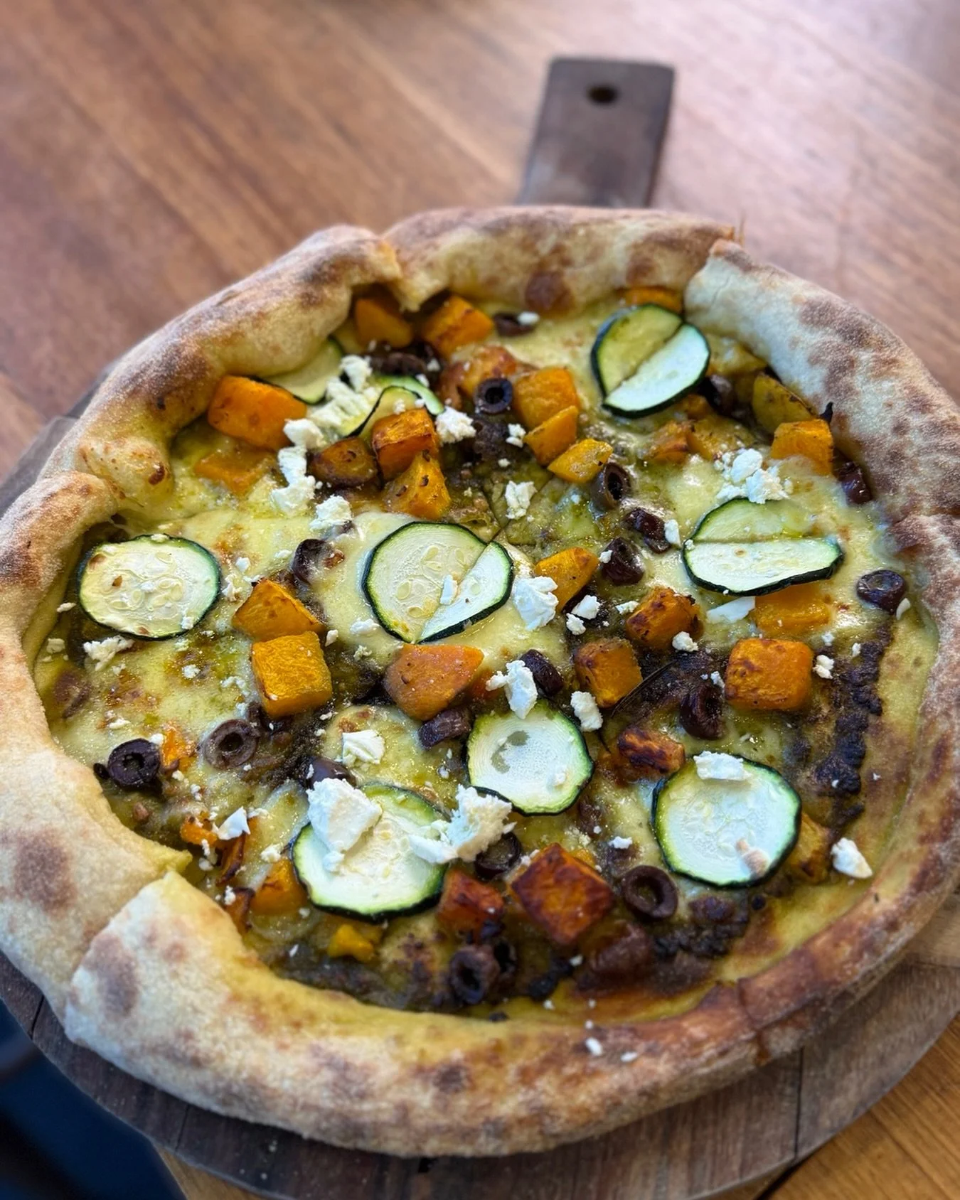 Lunching with us this week? You can&rsquo;t go wrong with one of our pizzas!

Our Pumpkin and Zucchini Pizza is a firm favourite, topped with scarmorza, olives, feta and pesto for that perfect balance of creamy, salty and fresh.

Pair it with a cheek