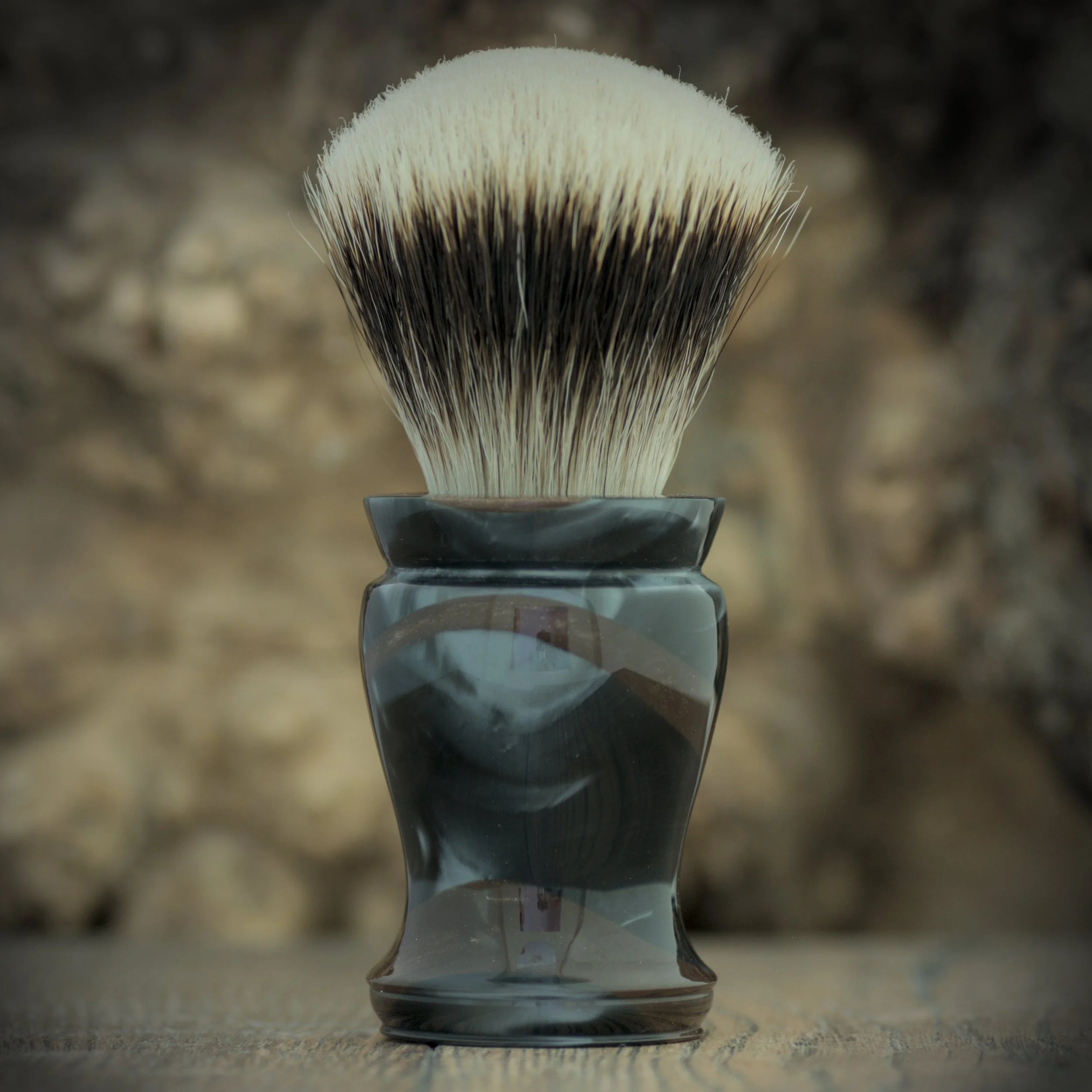 Ridire - dark silver and bronze resin.