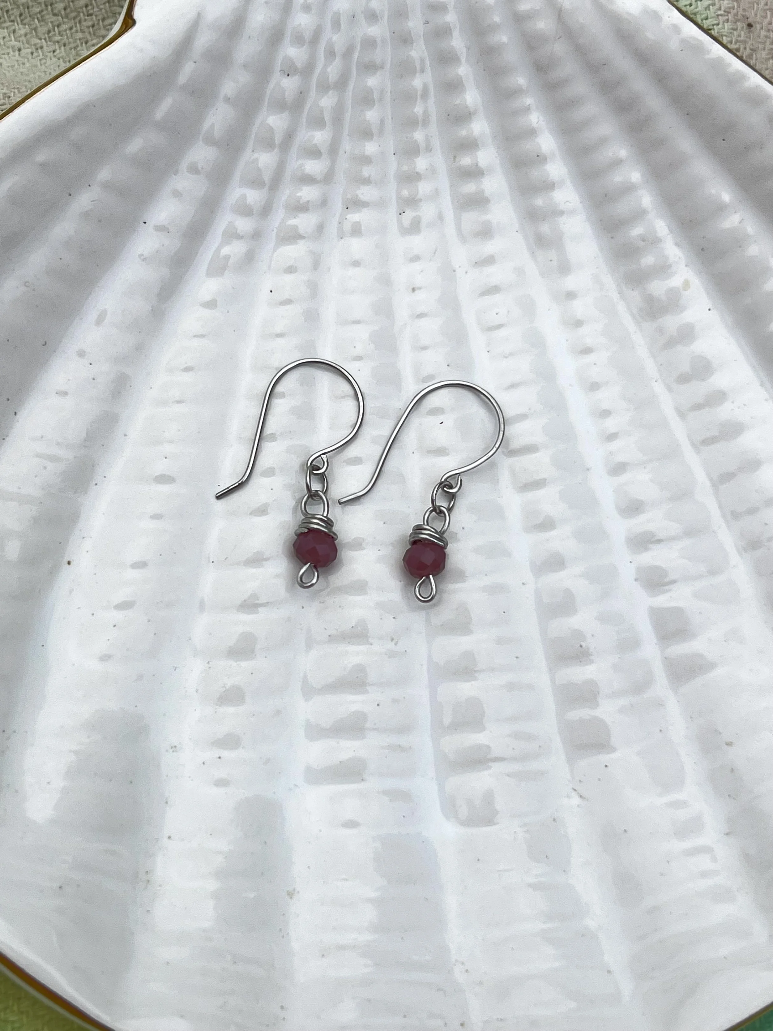 Silver earrings with purple stones