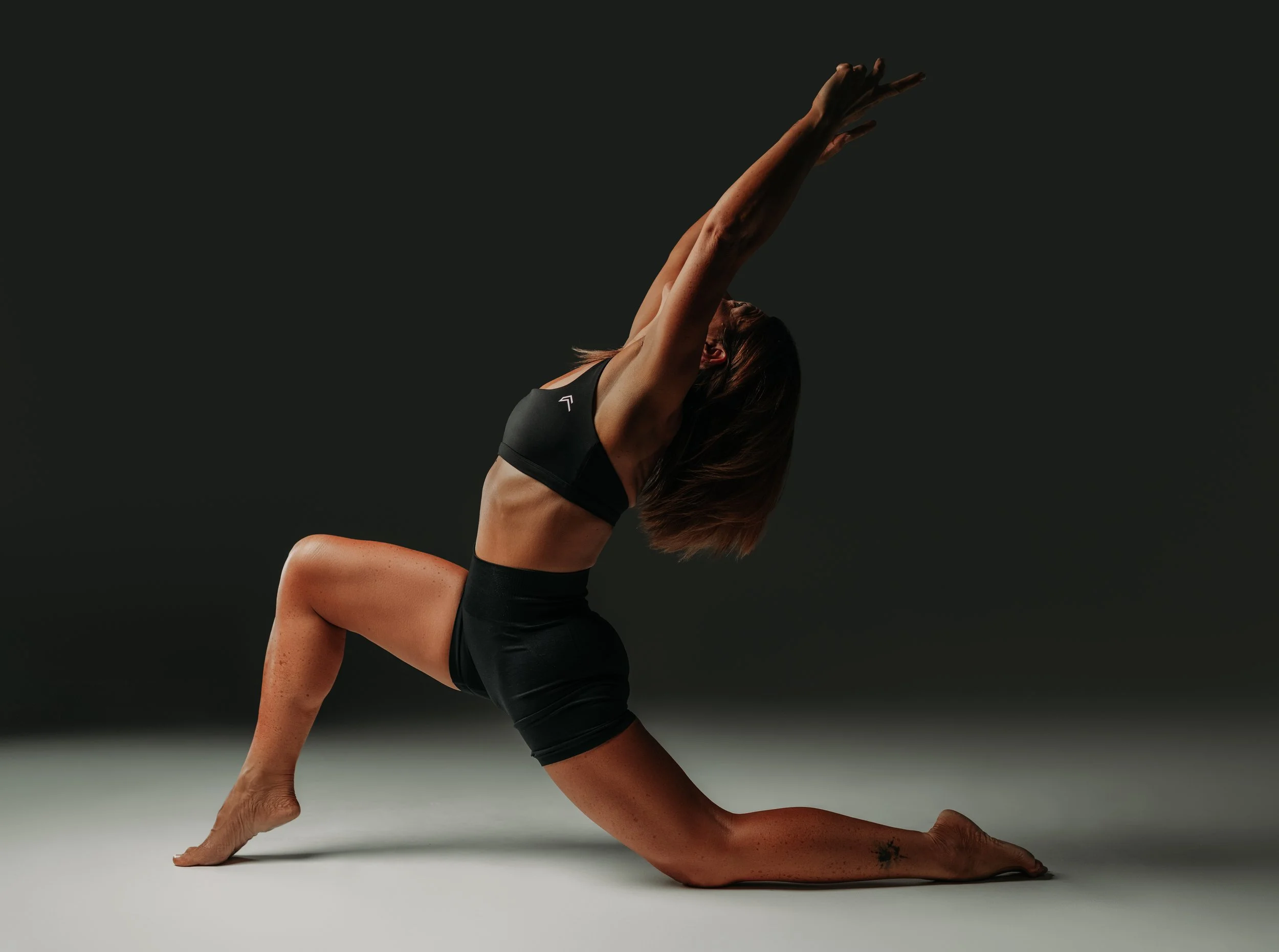 Yoga Teacher in crescent lunge