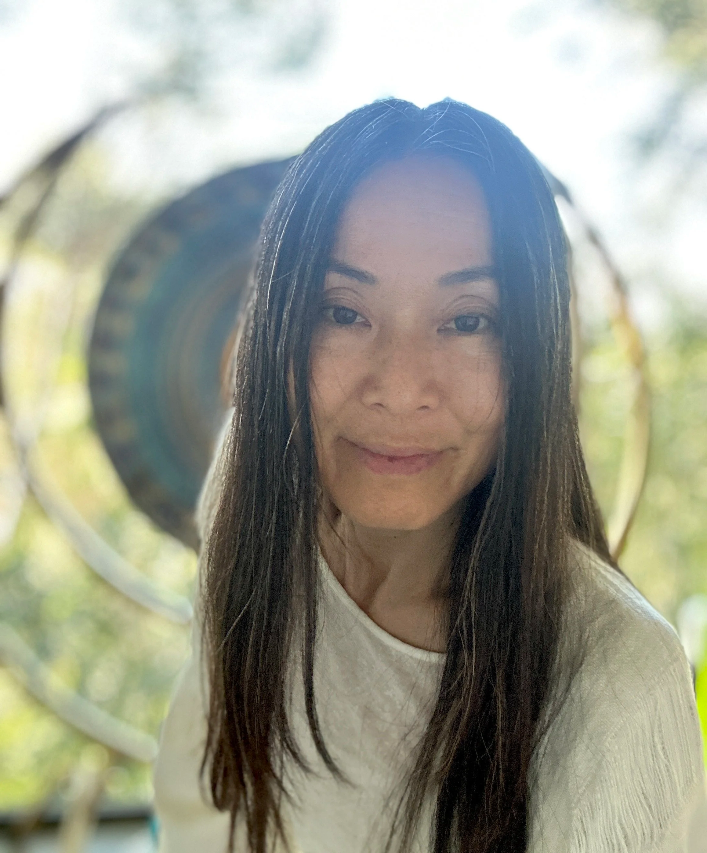 RaLuna certified sound healer in Ibiza with gong in background