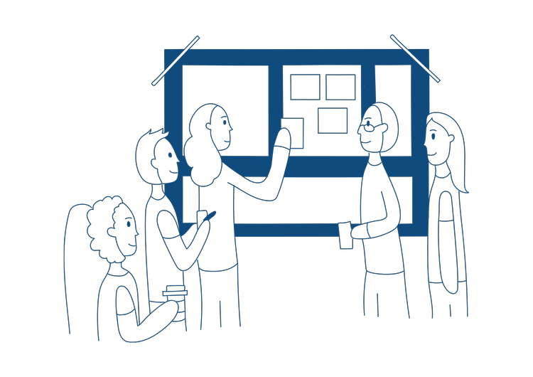 A group of people adding to a board of post-it notes