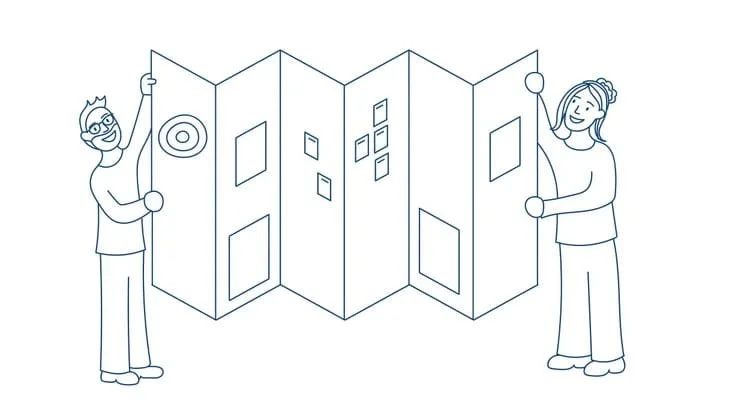 A man and woman holding up a large roadmap