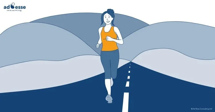 A female runner travelling forward