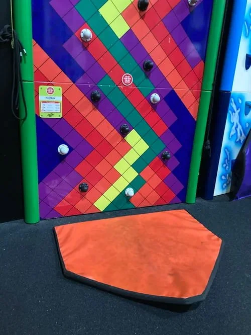 A children's climbing mat flat on the floor