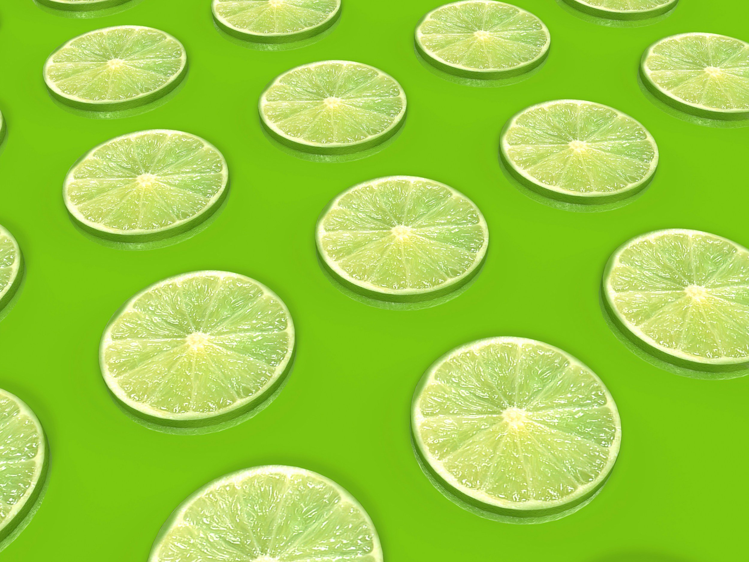 Sliced lime pattern on a bright green background
