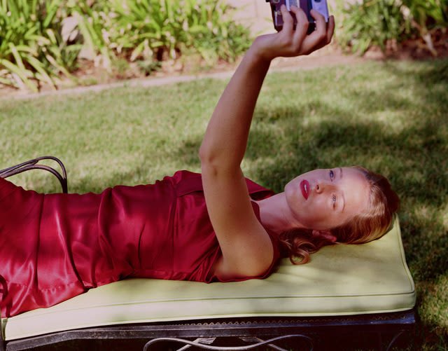 Danielle Nelson Mourning, Self-portrait as Mrs. Brown (red dress)