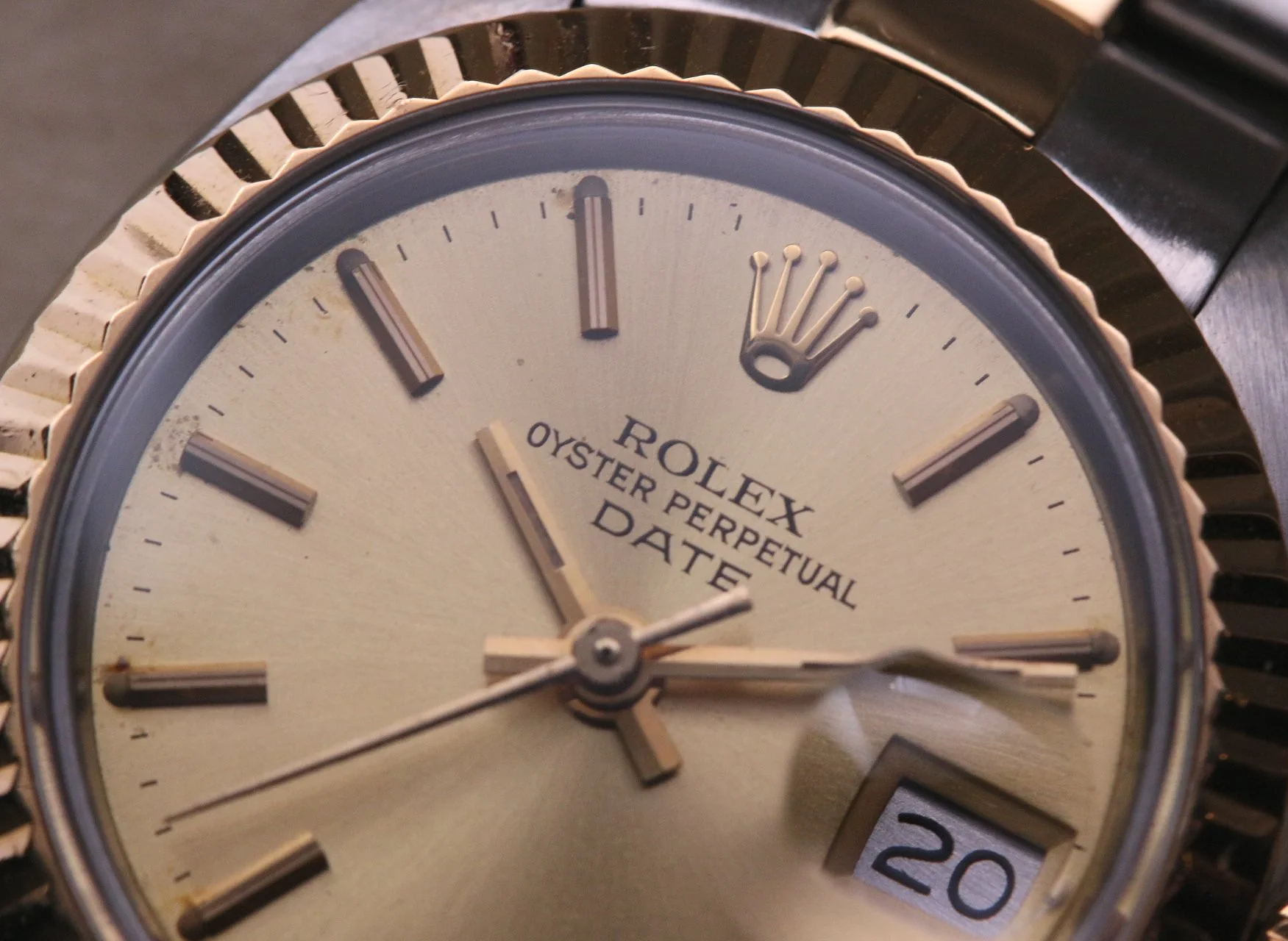 Close-up of a ladies Rolex oyster perpetual date, with a date display at 3 o'clock.