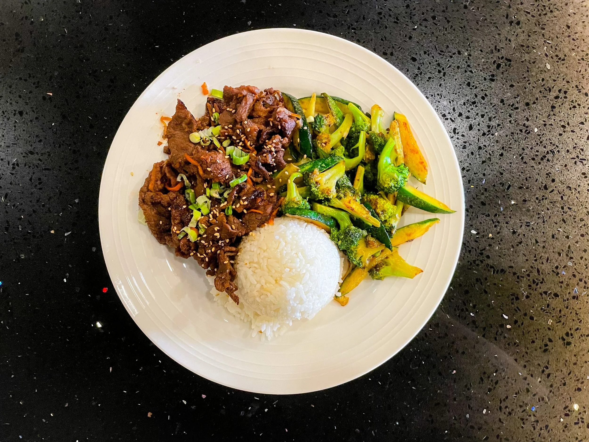 Bulgogi Hibachi with White Rice — Korean style marinated sweet beef, served with broccoli, zucchini, and a choice of steamed rice, fried rice, or lo mein