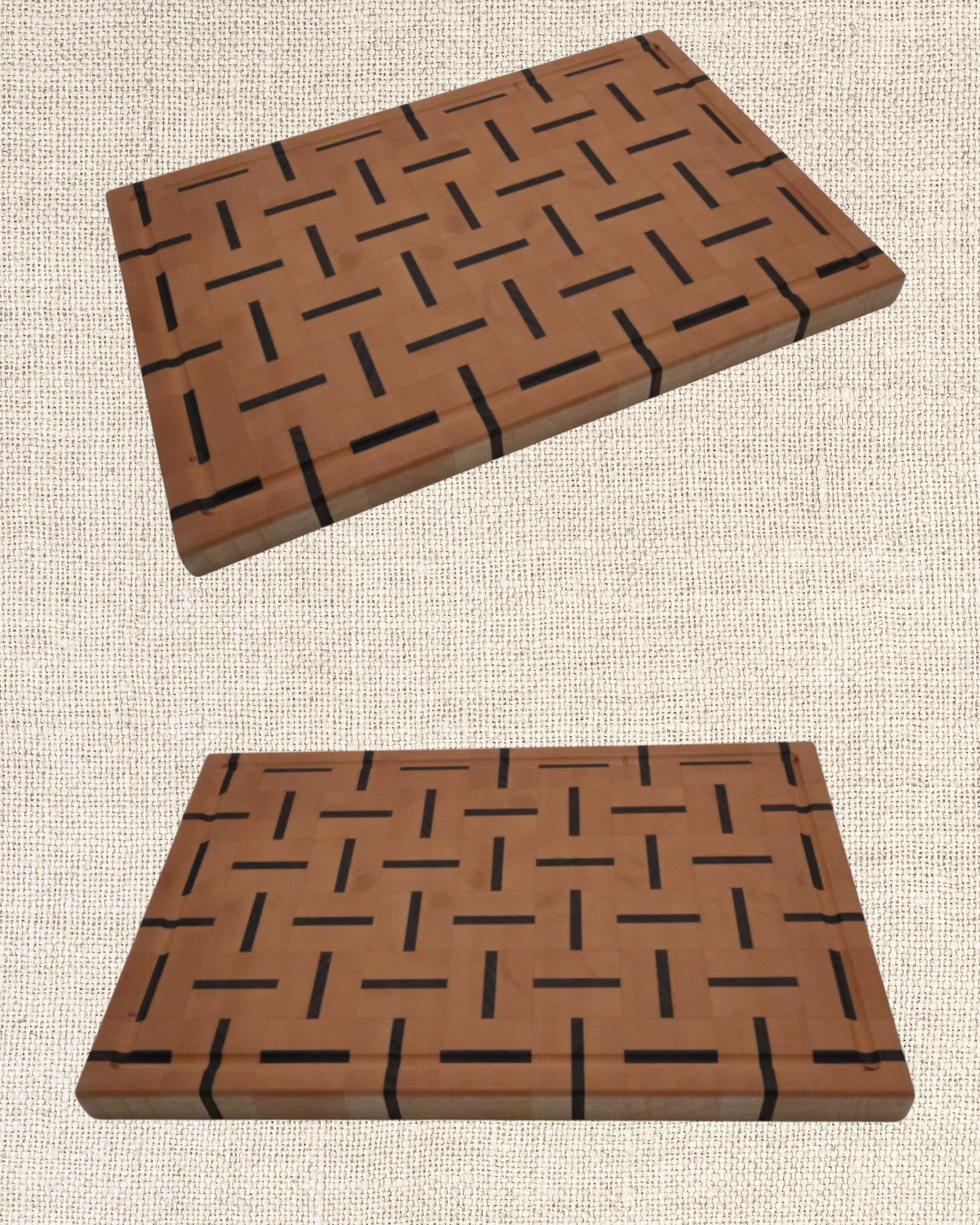 Two wooden chessboard-style cutting boards with a black geometric pattern, one placed above the other on a textured beige surface.