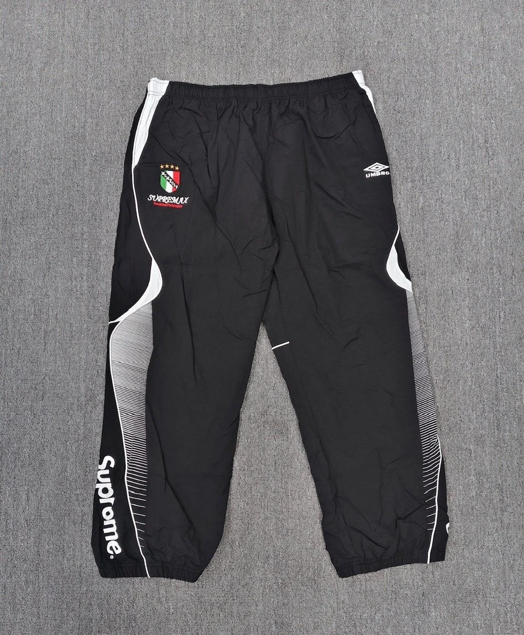 S*preme x U*bro Track Pants