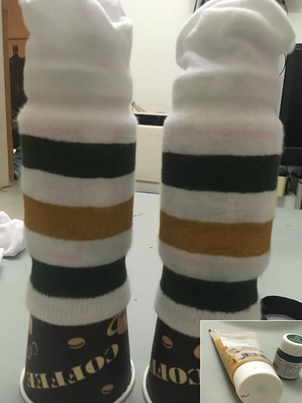  I added green and mustard stripes to the socks 