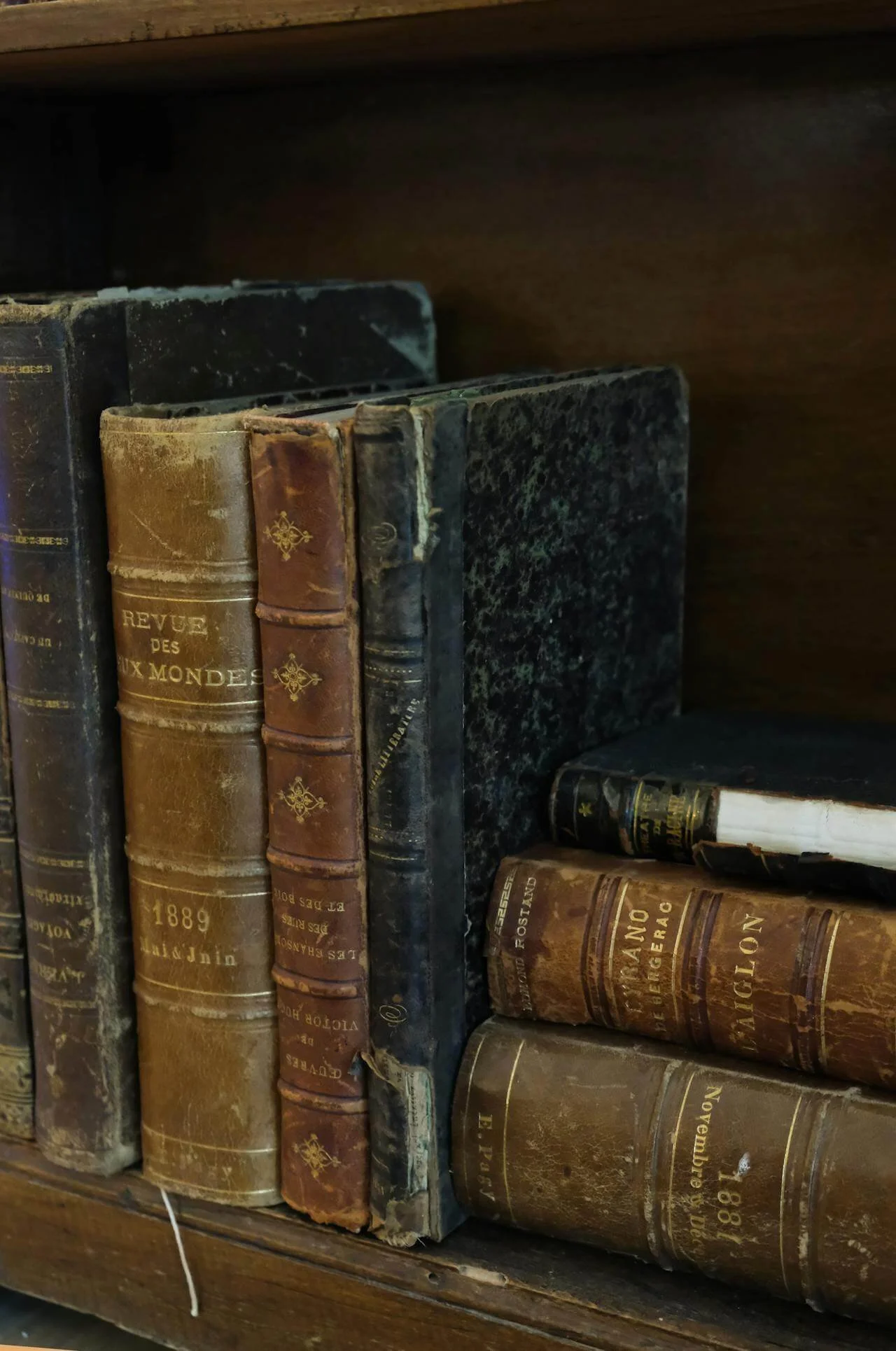 Stacks of antique books for out-of-network therapy page, Vita Counseling Center in San Antonio, Texas.