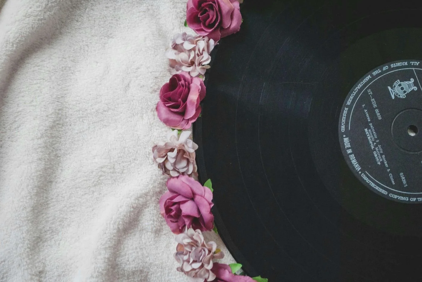 Vinyl record with flowers, renewal and being yourself again in therapy for therapists San Antonio Texas
