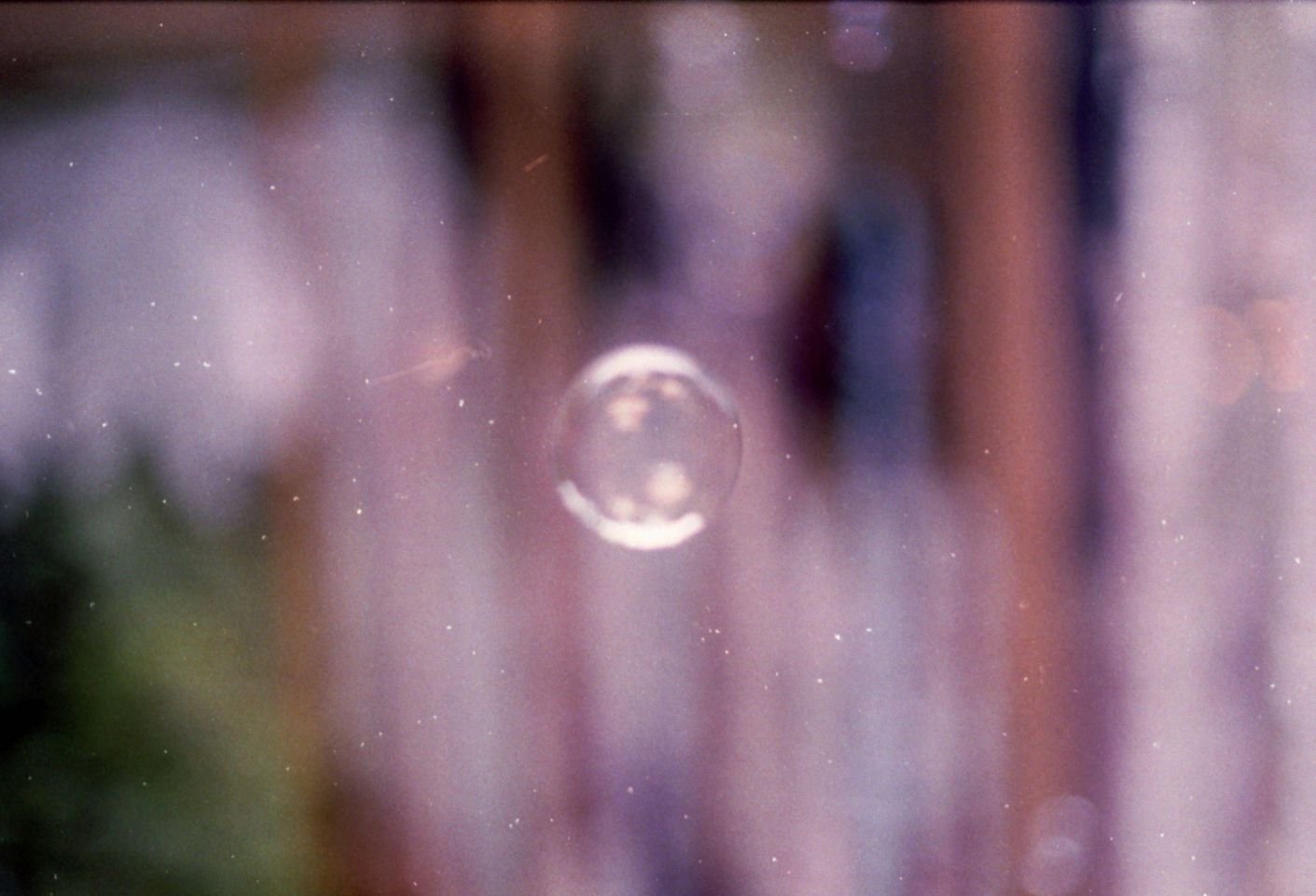Single soap bubble floating in the wind, attachment and perfectionism therapy San Antonio Texas