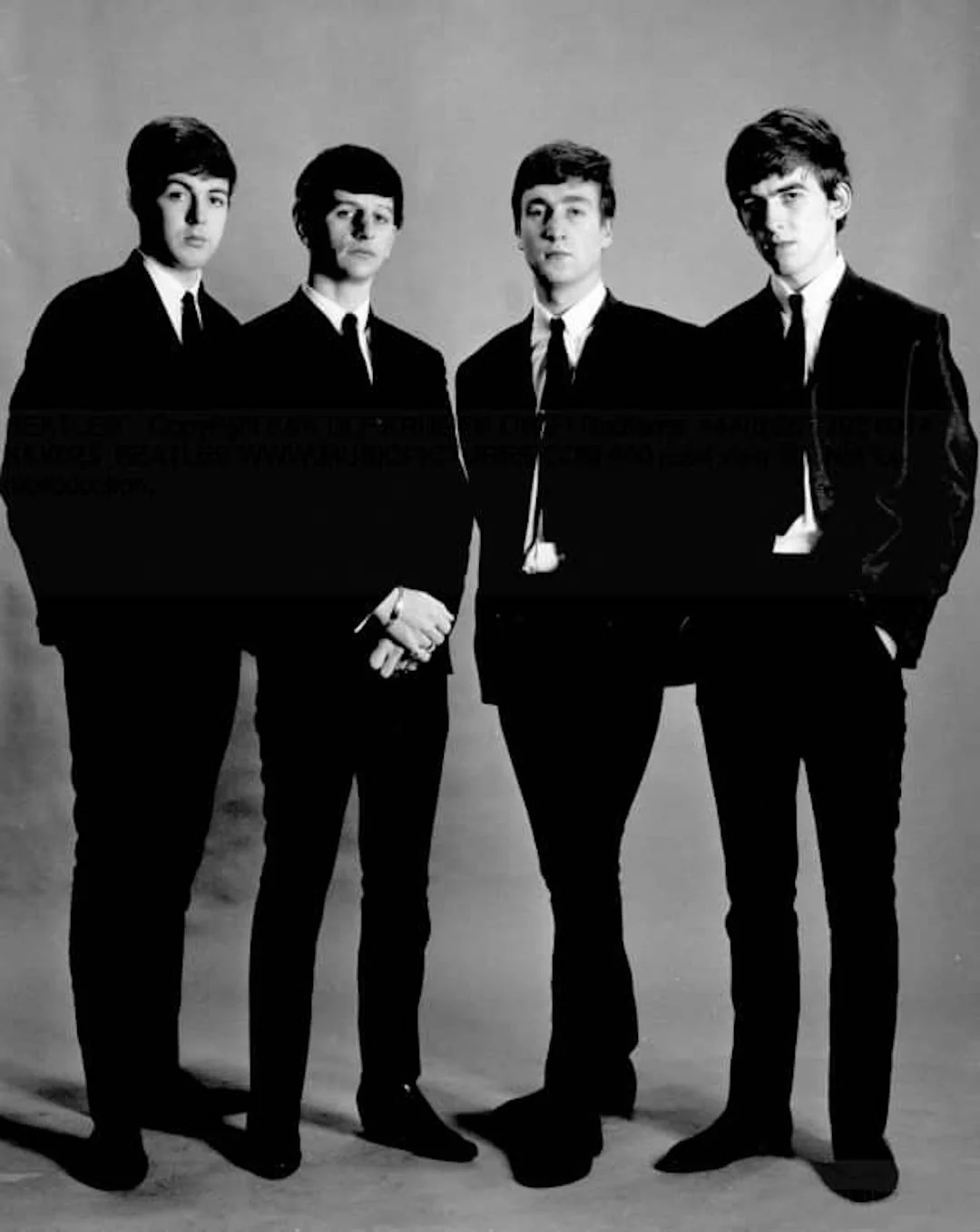   Paul, Ringo, John, and George with their "new" suits, modeling in Hamburg Germany November 1962  