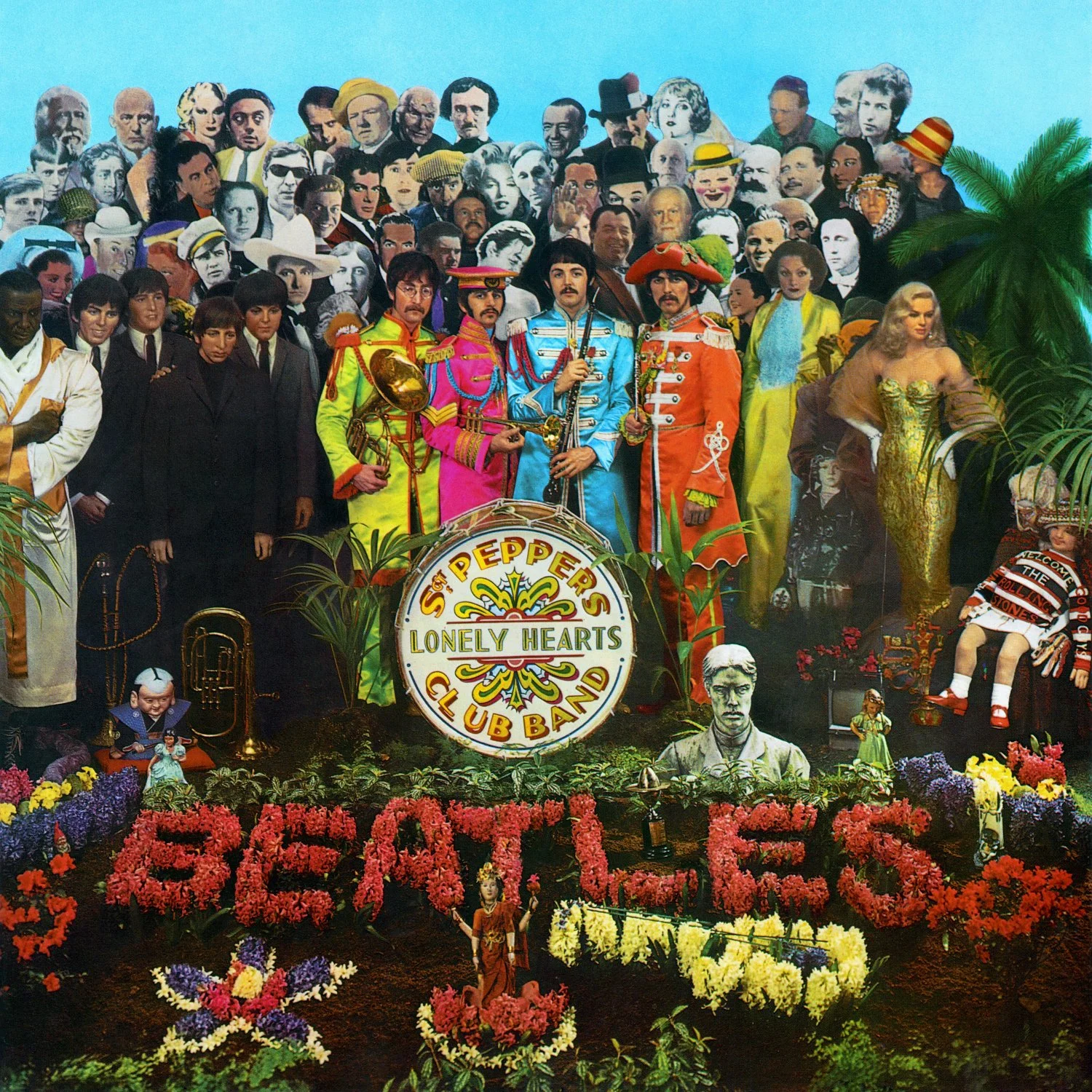 A colorful collage featuring The Beatles in vibrant costumes, surrounded by numerous portraits and characters, with a large floral display spelling out "BEATLES" in front, and the band name "Lonely Hearts Club Band" on a drum in the center. The collage includes flowers, illustrations, and cutouts, evoking a psychedelic rock and pop art aesthetic.