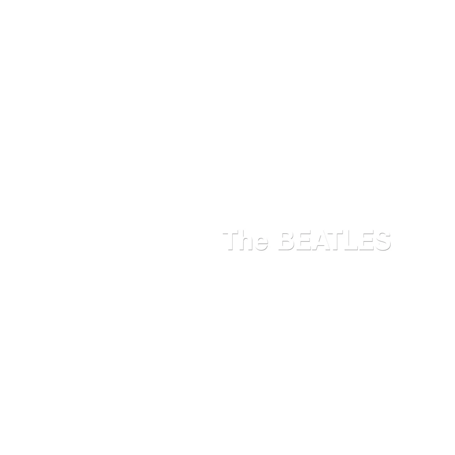 White album cover with embossed text 'The BEATLES' in the bottom right corner.
