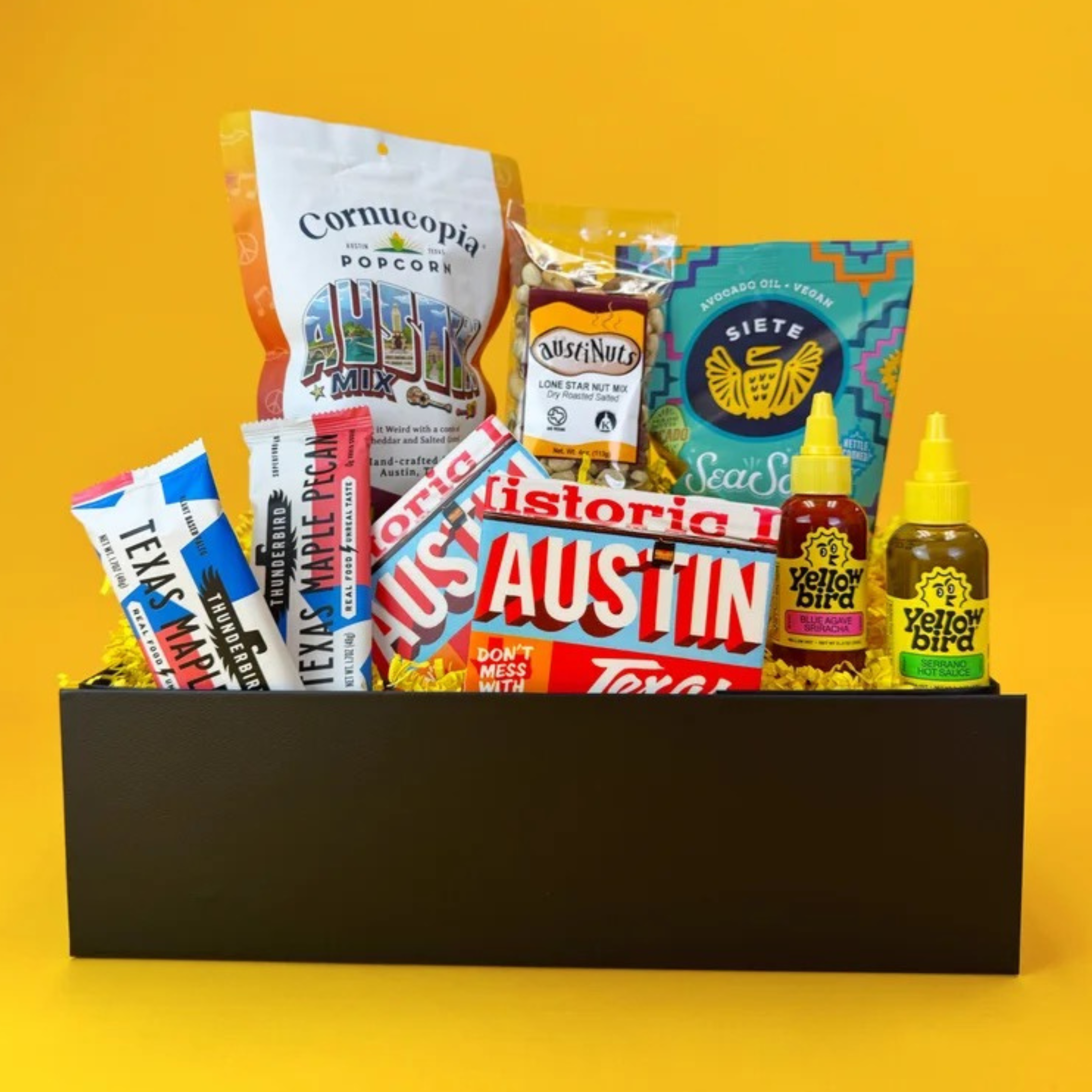 Austin gift box with local snacks, hot sauces, popcorn, nuts and ceramic coasters