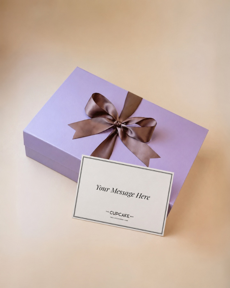 The Violet Crown Wellness Gift, featuring items from small and local women-owned businesses in Austin, Texas. Purple box with satin ribbon and notecard