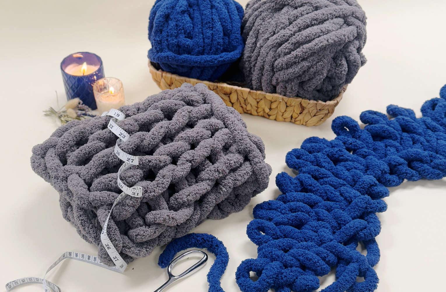 Cozy chunky blankets in the process of being made along with supplies included in the virtual class kit