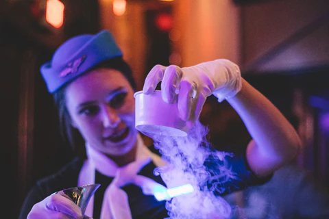 Costumed roaming bartender from The Cupcake Bar serving up flash frozen nitro treats at a SXSW event in Austin, TX
