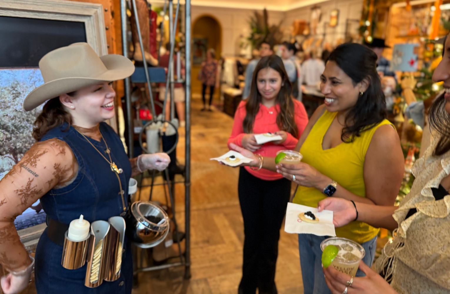 Our attendant provides roaming caviar to guests at the Yellow Rose by Kendra Scott in Austin