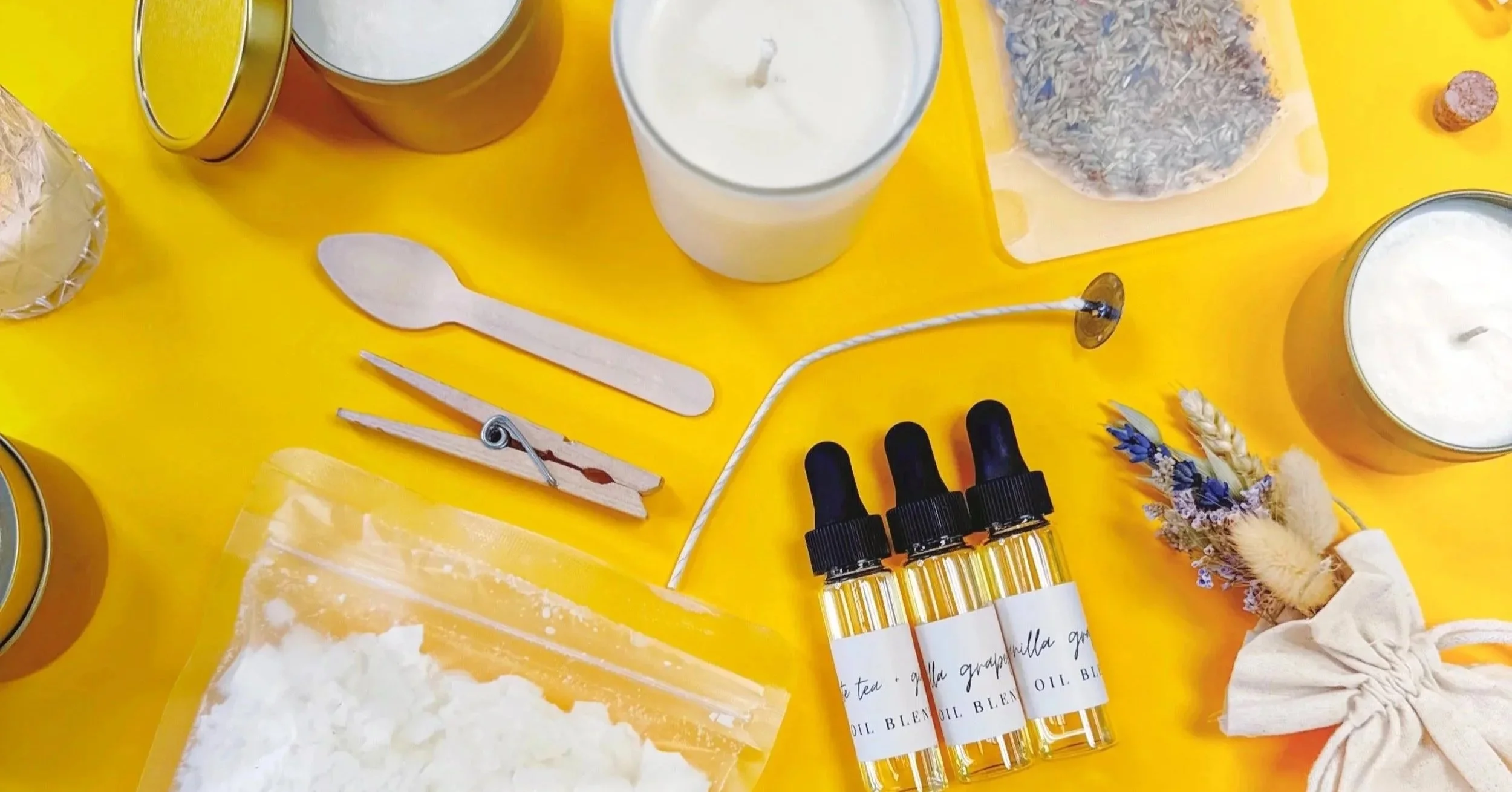 Contents from our virtual candle class kit, including wax, vessels, flowers, fragrances, and more!