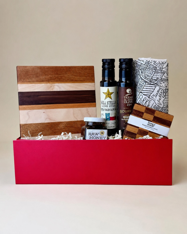 Hill Country Provisions features artisan Texas olive oils, raw honey, and handcrafted kitchen essentials—an elegant gift inspired by classic Hill Country flavors.
