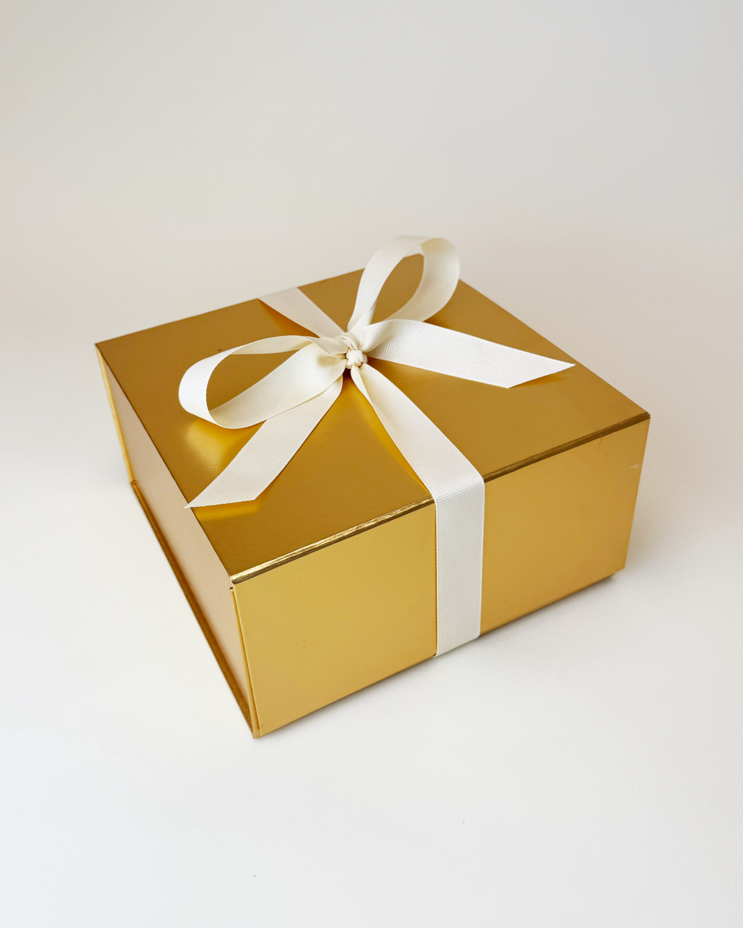 Sleek and presentable gift box packaging, featuring a luxurious magnetic flap gift box and a perfectly tied bow