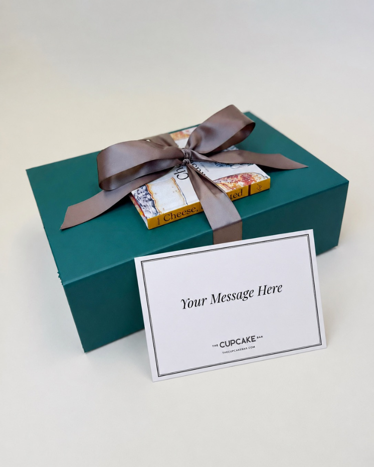 Sleek and presentable gift box packaging, featuring a luxe green magnetic closure gift box and satin bow, along with a handwritten notecard