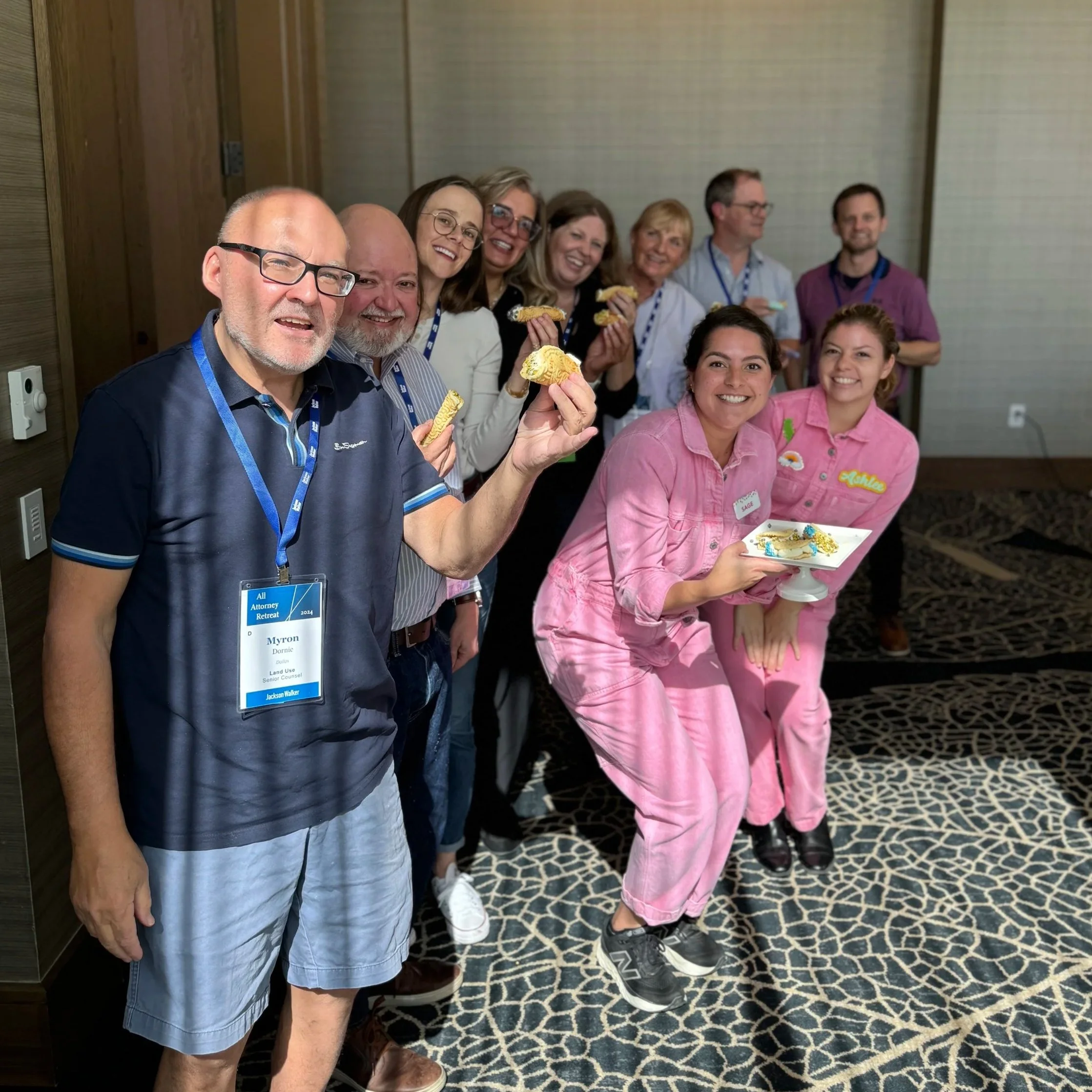 A group of participants smile alongside our instructor in an in-person Cannoli Class in Austin, Texas