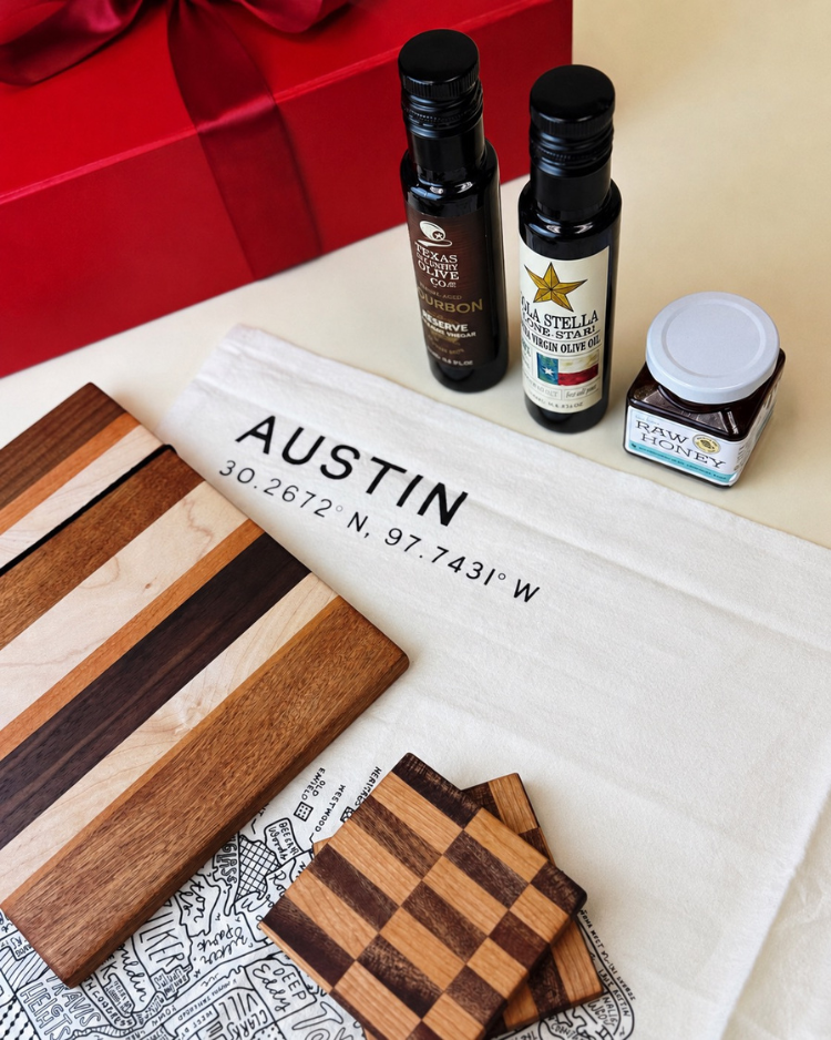 Hill Country Provisions features artisan Texas olive oils, raw honey, and handcrafted kitchen essentials—an elegant gift inspired by classic Hill Country flavors.