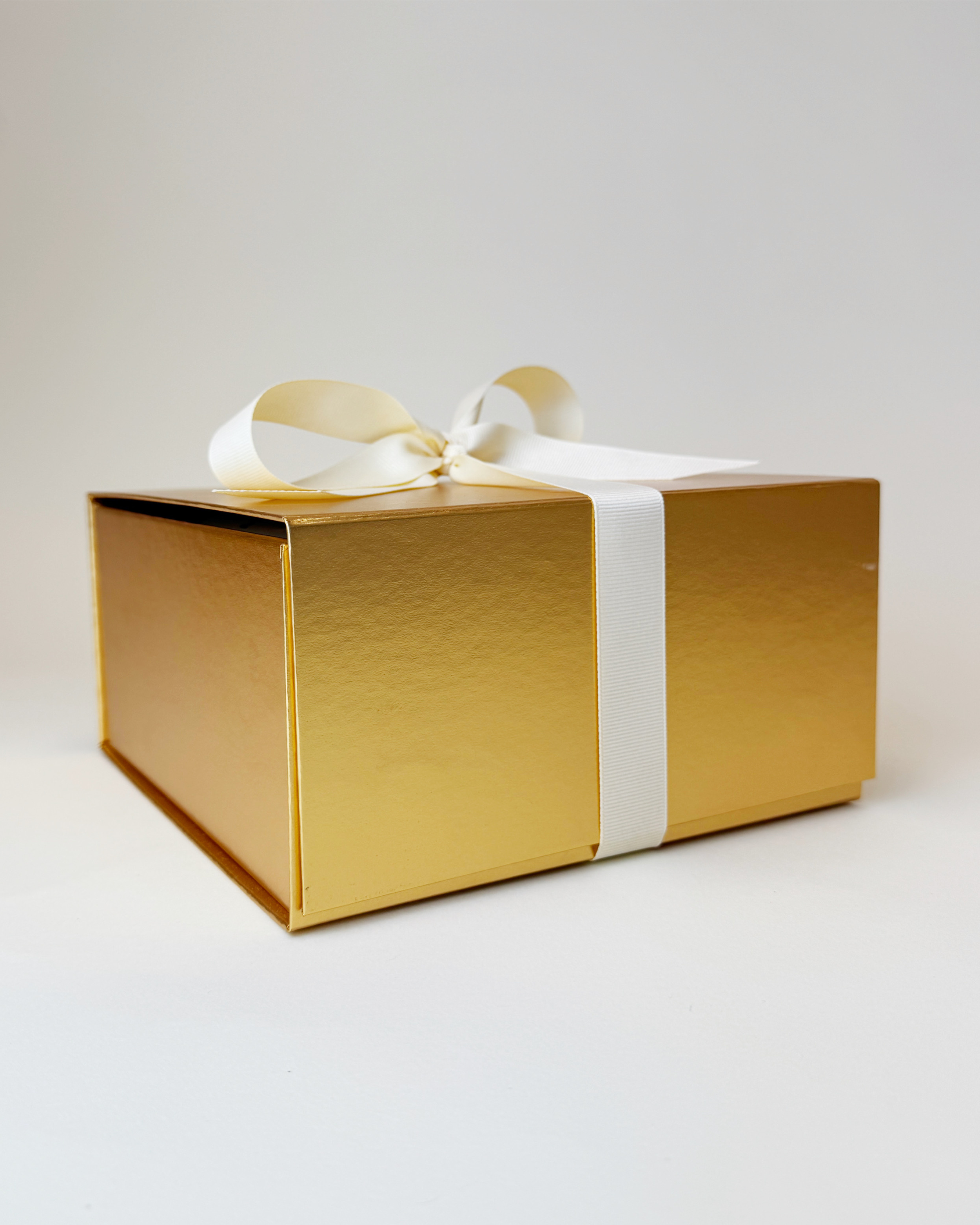 Sleek and presentable gift box packaging, featuring a luxurious magnetic flap gift box and a perfectly tied bow