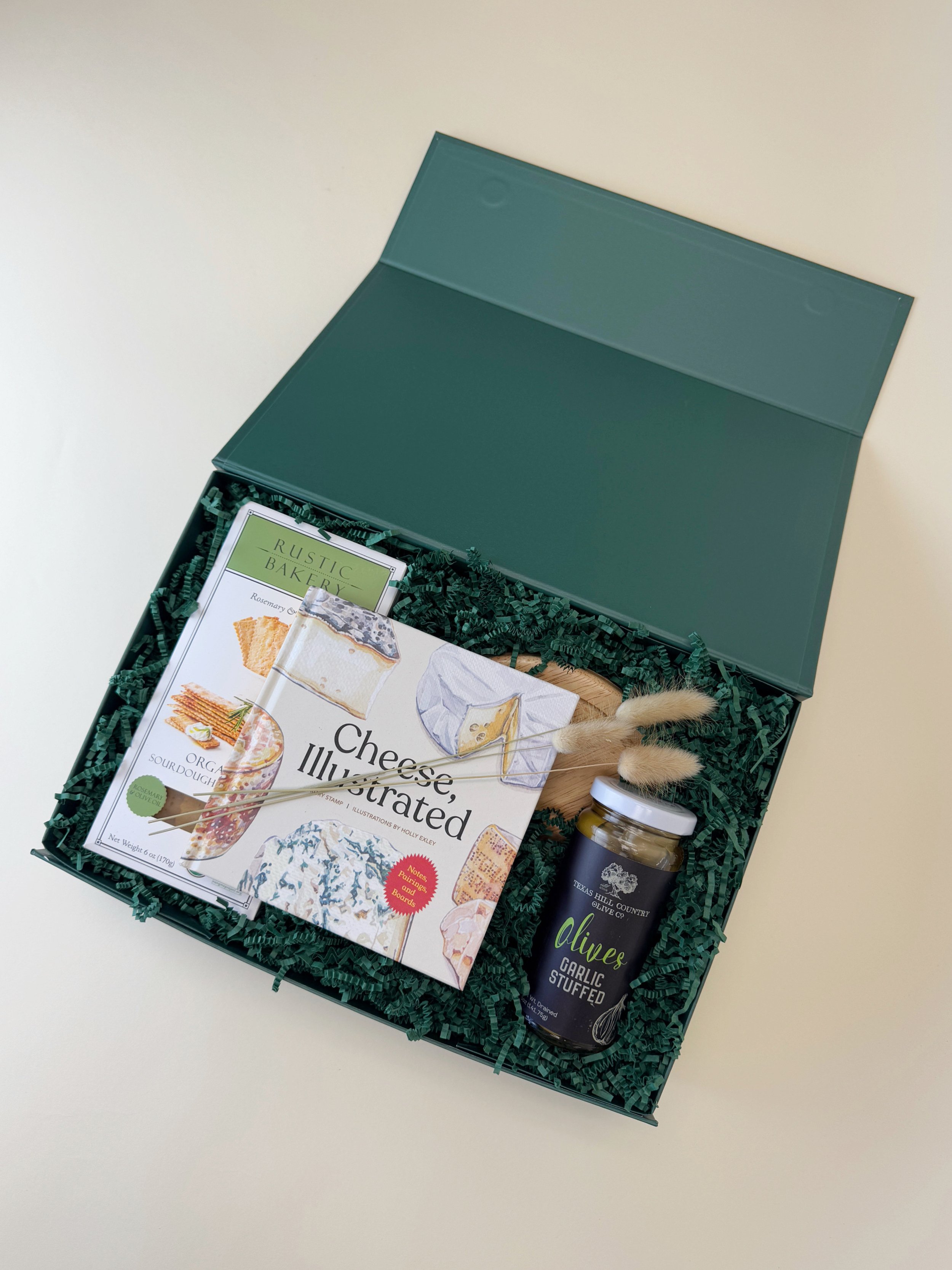 Ready to ship packaging of our curated charcuterie gift box of perfect cheese pairings