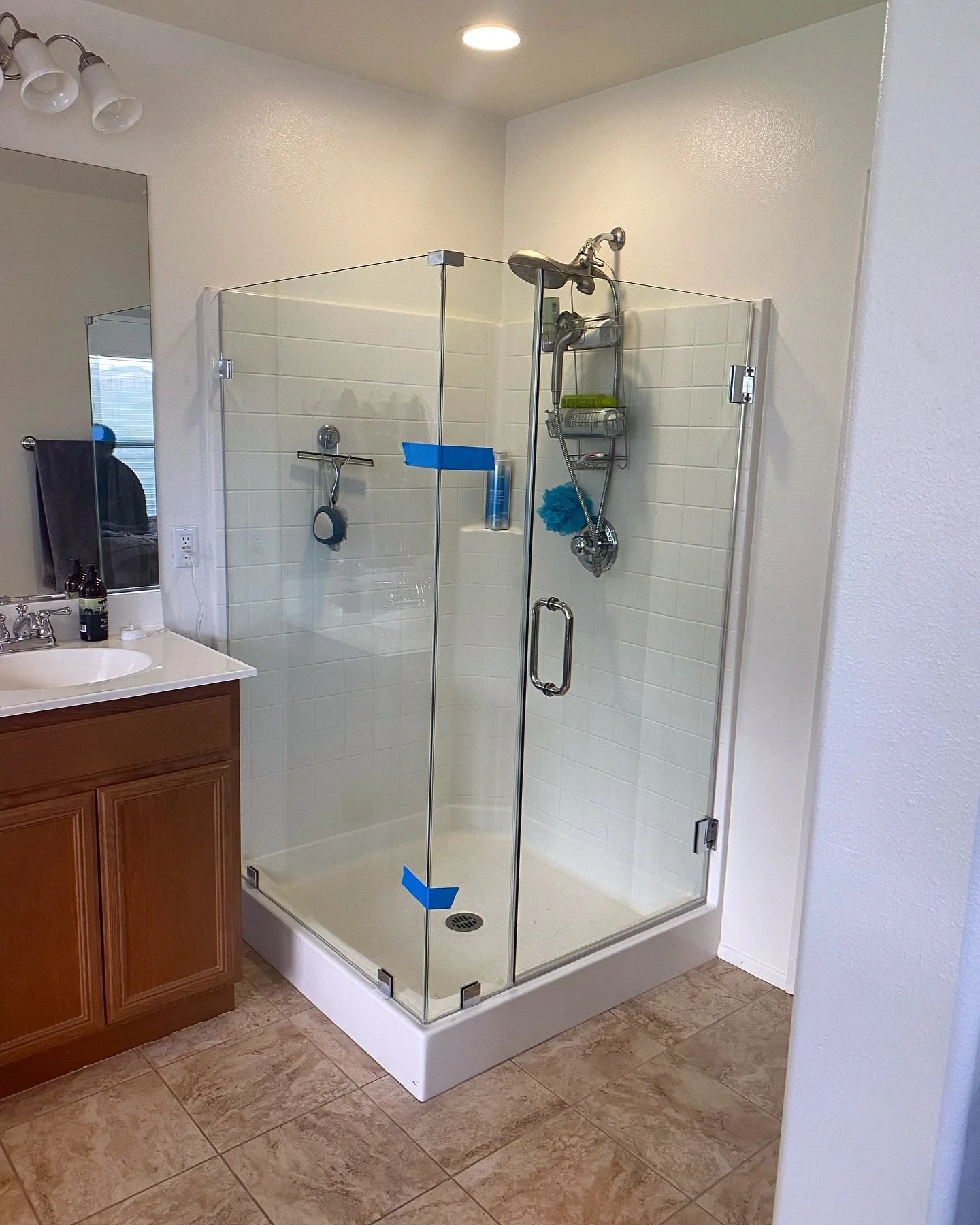 DID YOU KNOW? That the average person spends about 2 years of their lifetime in the shower? Might as well have the shower of your dreams then! This frameless 90 degree unit is dazzling paired with shiny chrome hardware. Call in for a quote today! (94